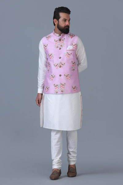 Elevate your style with our light pink Nehru Jacket, adorned with intricate floral motifs, perfectly paired with an off-white kurta pajama ensemble.