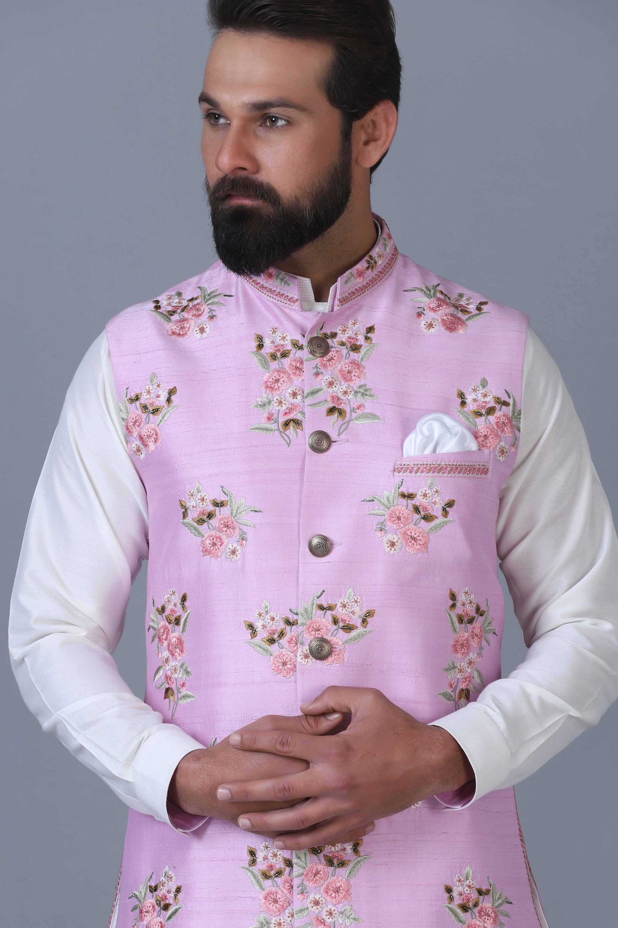 Elevate your style with our light pink Nehru Jacket, adorned with intricate floral motifs. Shop Now!