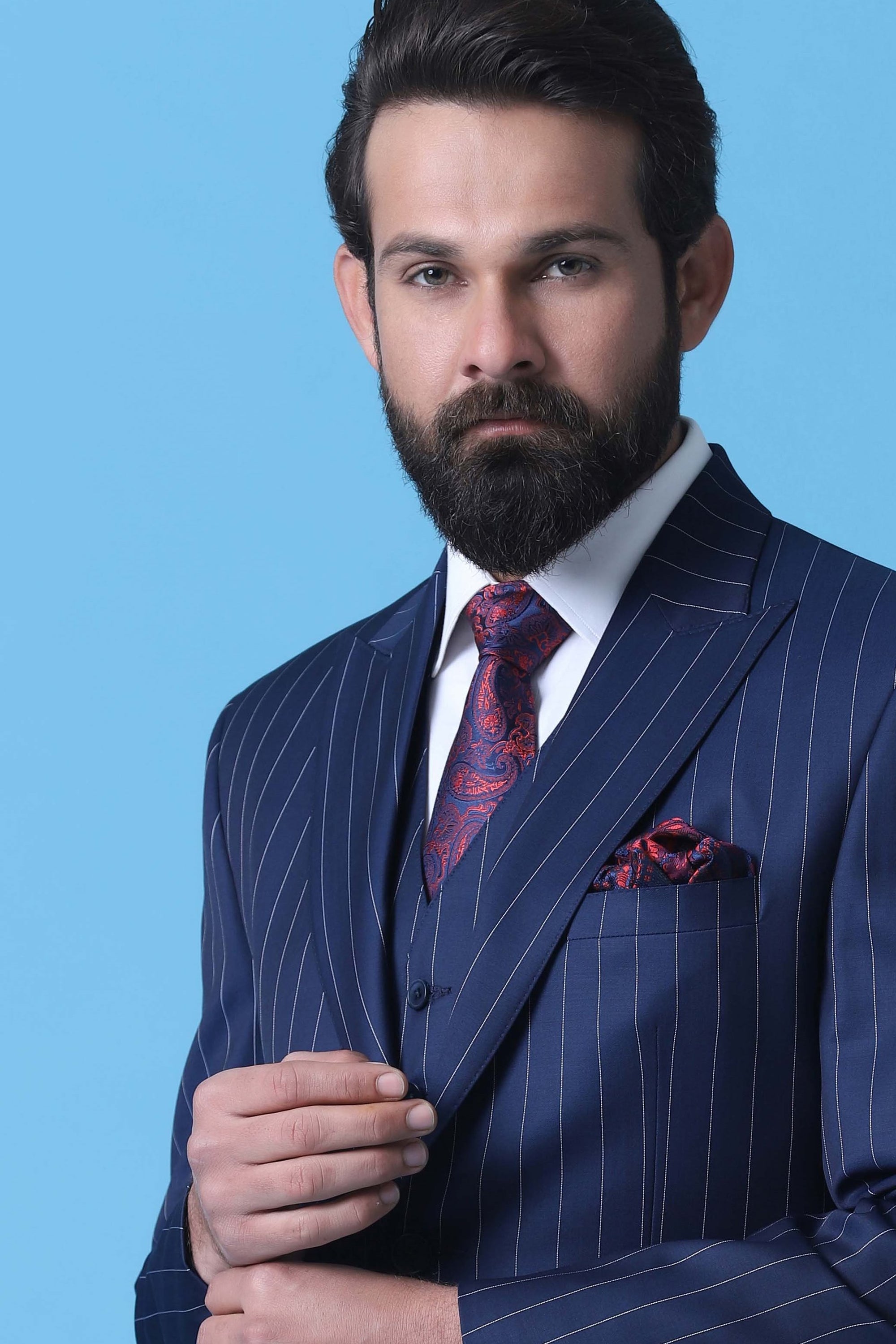 Make a statement with our Bold 3-Piece Suit in Navy Chalkstripe Wool Fabric. Shop Now!