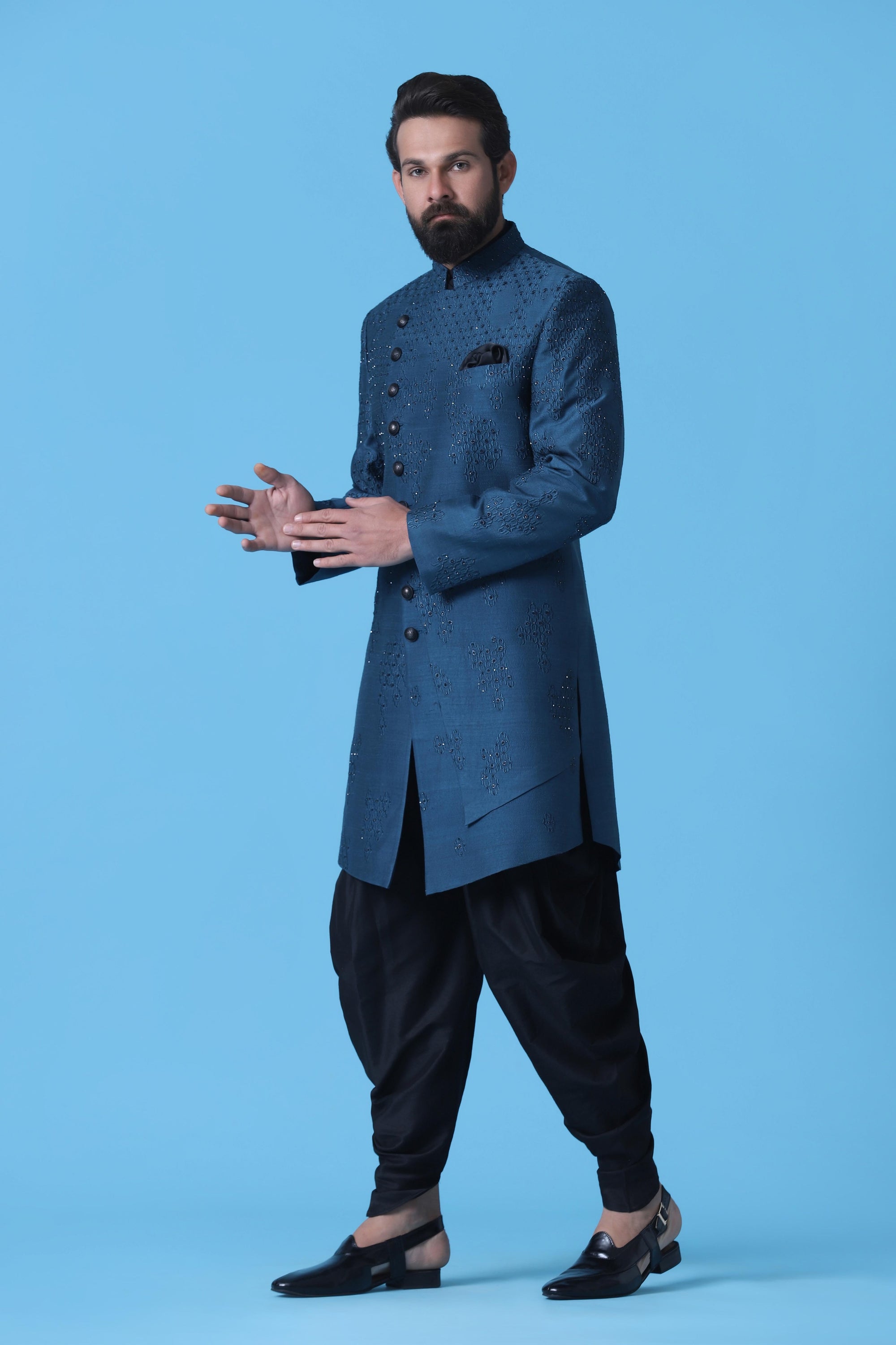 Elevate your ethnic look with this Teal Blue Indowestern with subtle geometric embroidery. Shop Now!
