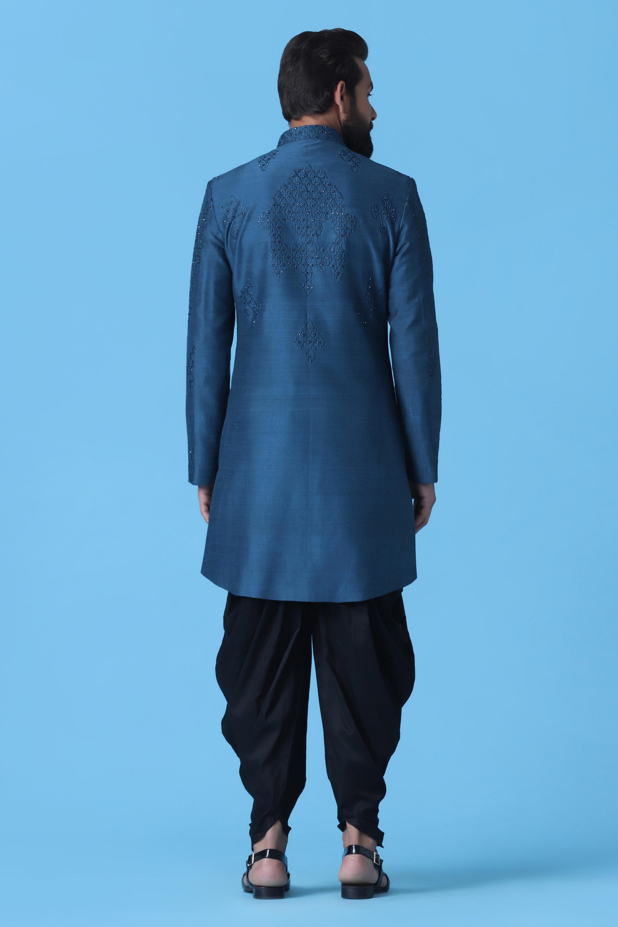 Elevate your ethnic look with this Teal Blue Indowestern with subtle geometric embroidery. Shop Now!