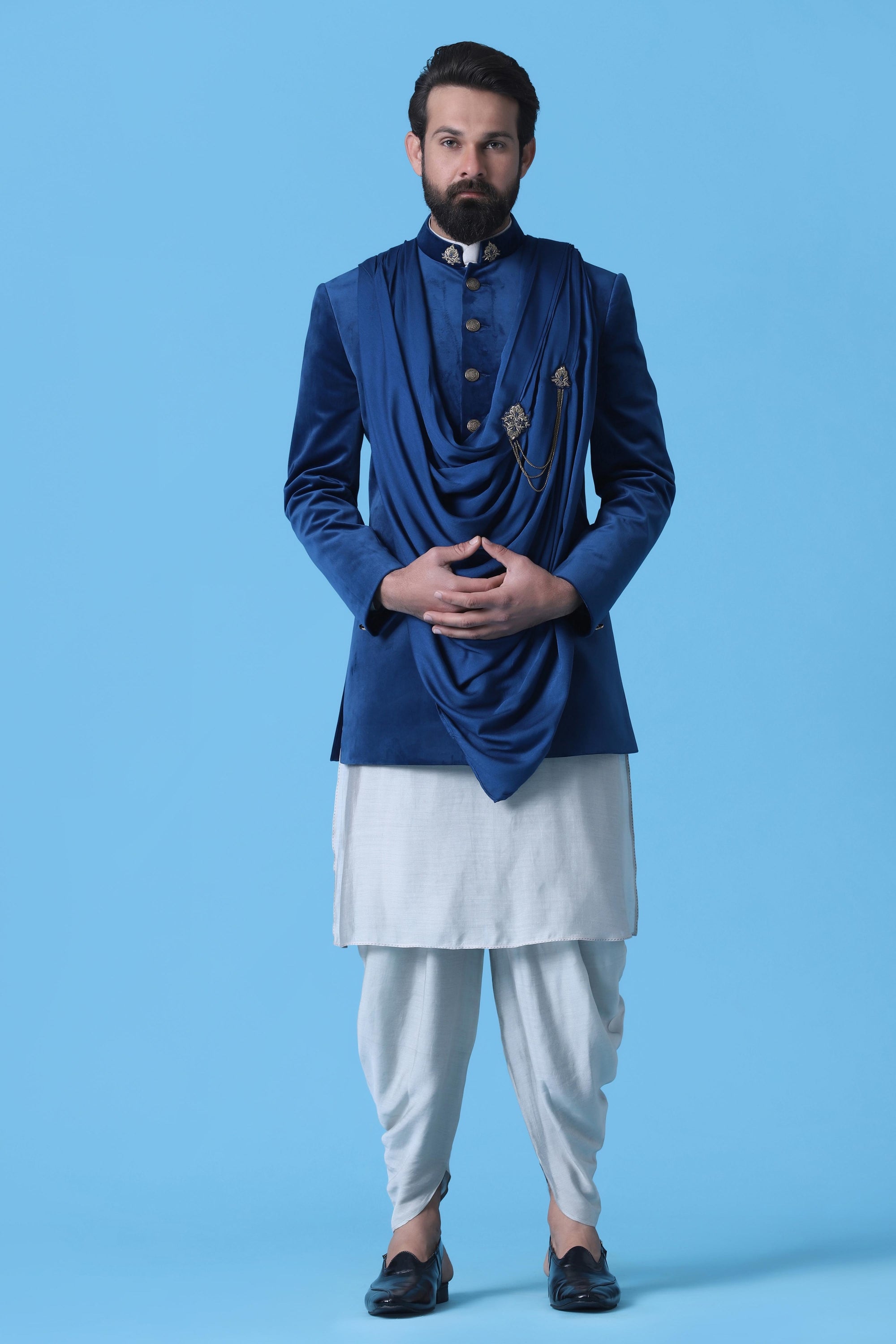 Make a statement in this Blue Velvet Indowestern featuring a stylish drape. Shop Now!