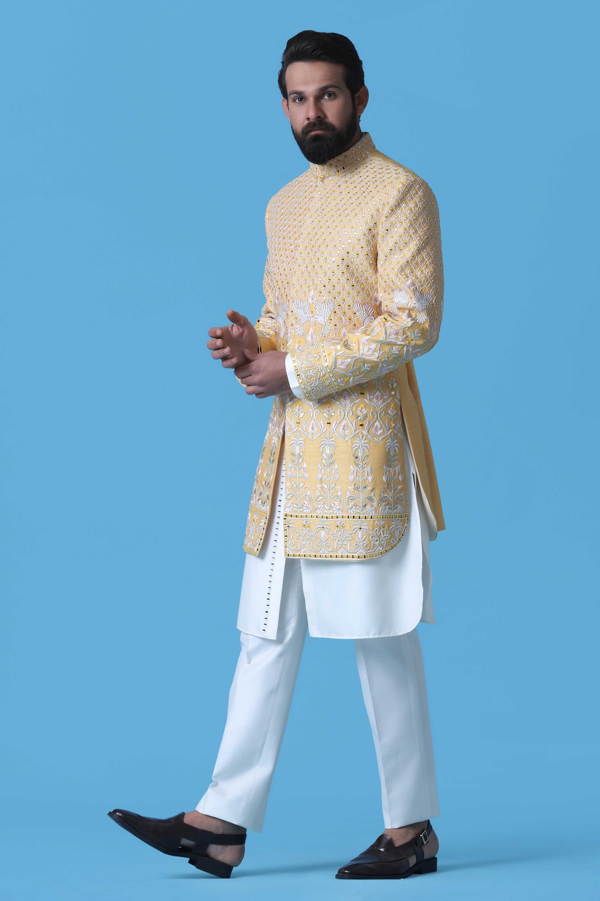 Exude elegance in this soft yellow Raw Silk Indowestern. Shop Now!