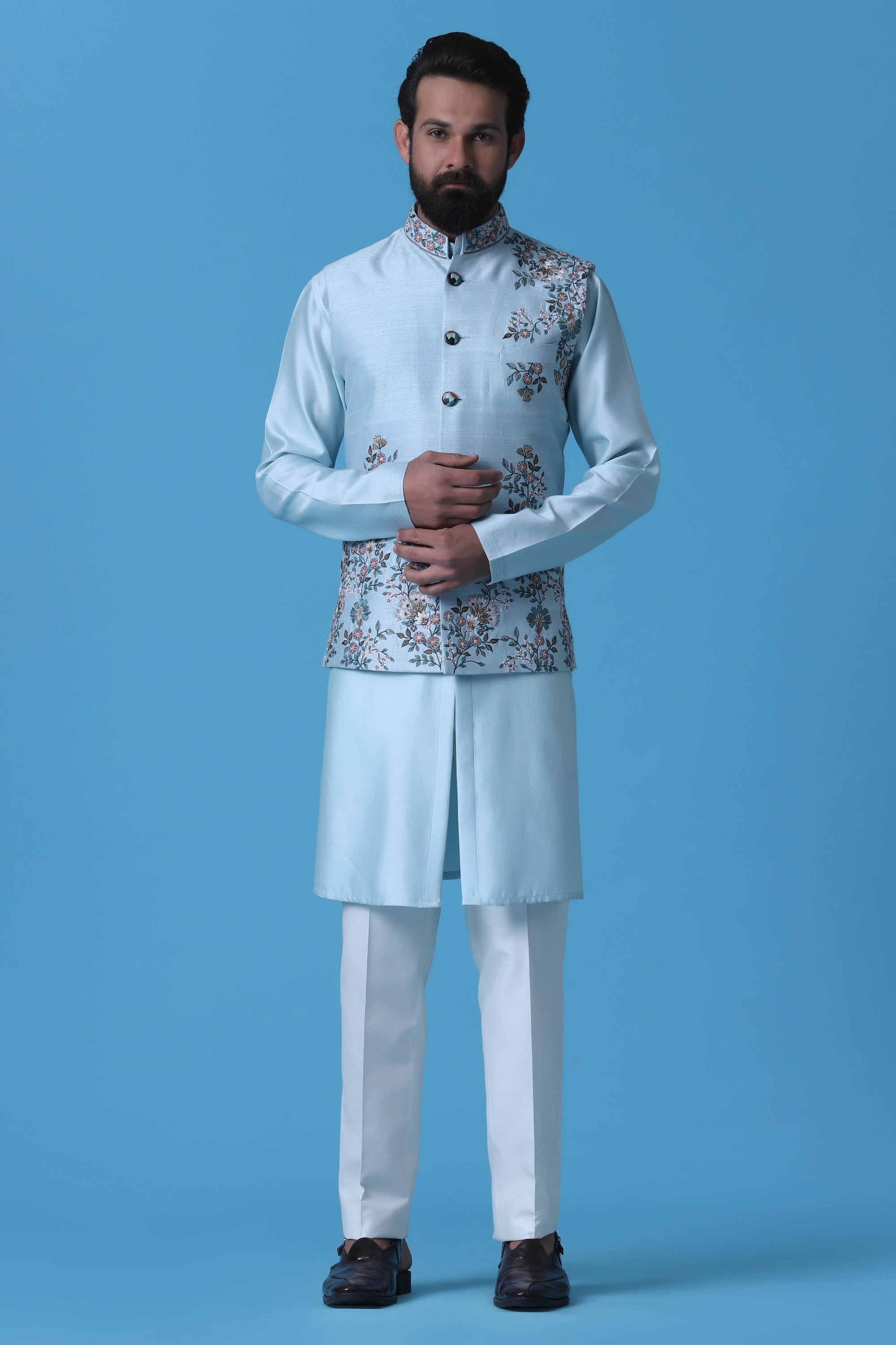 Elevate your style with our Light Blue raw silk Nehru Jacket. Shop Now!