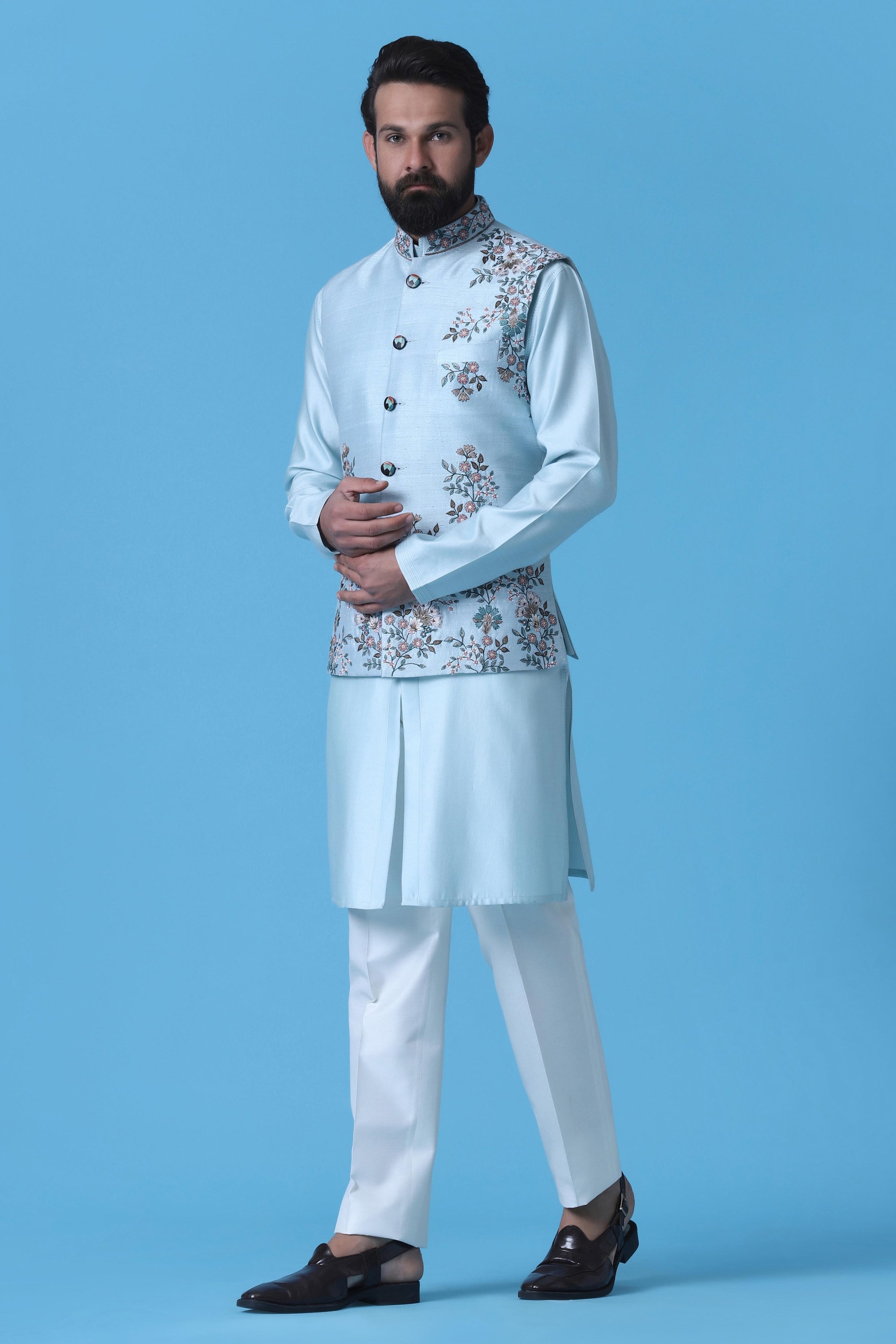 Elevate your style with our Light Blue raw silk Nehru Jacket. Shop Now!