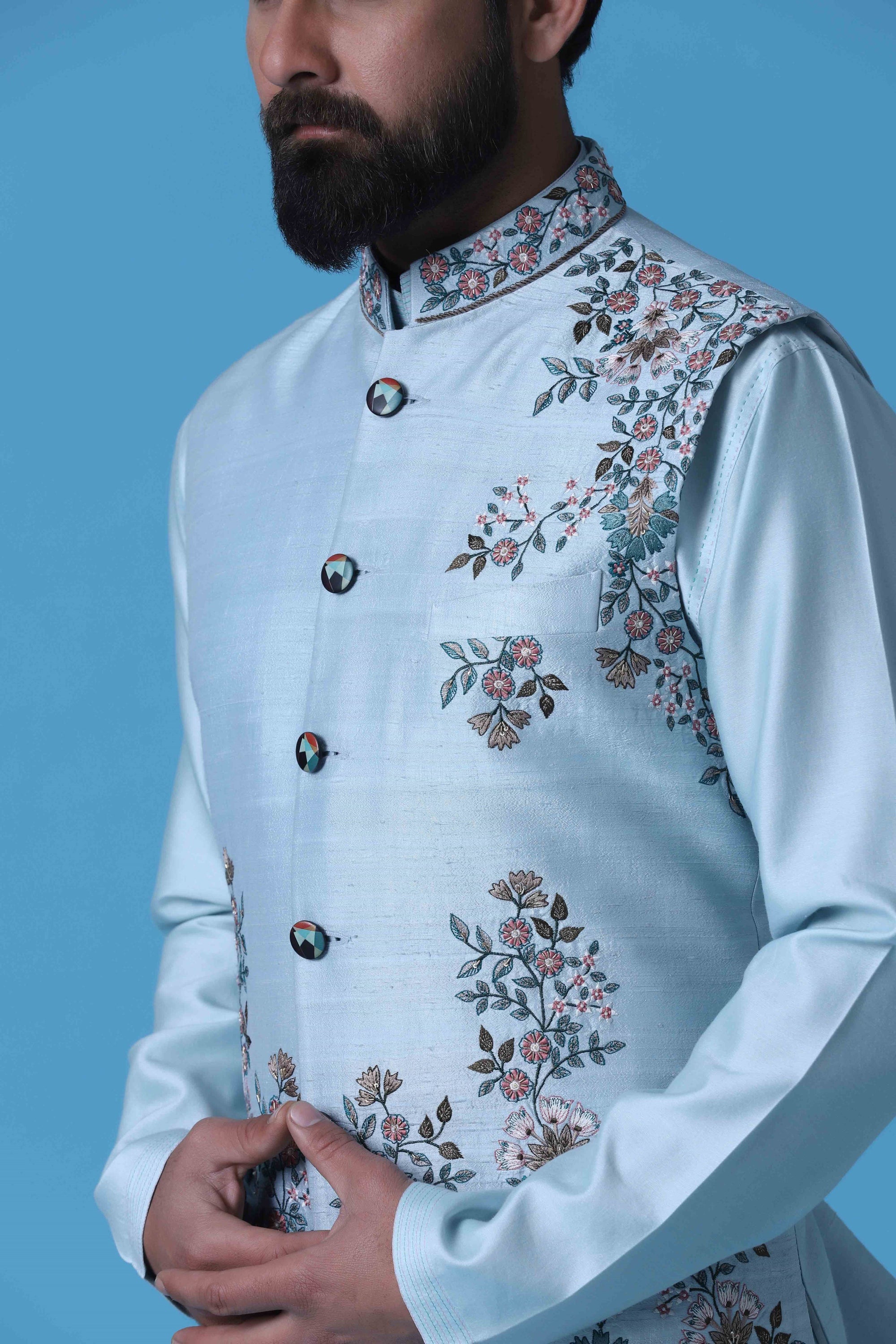 Elevate your style with our Light Blue raw silk Nehru Jacket. Shop Now!