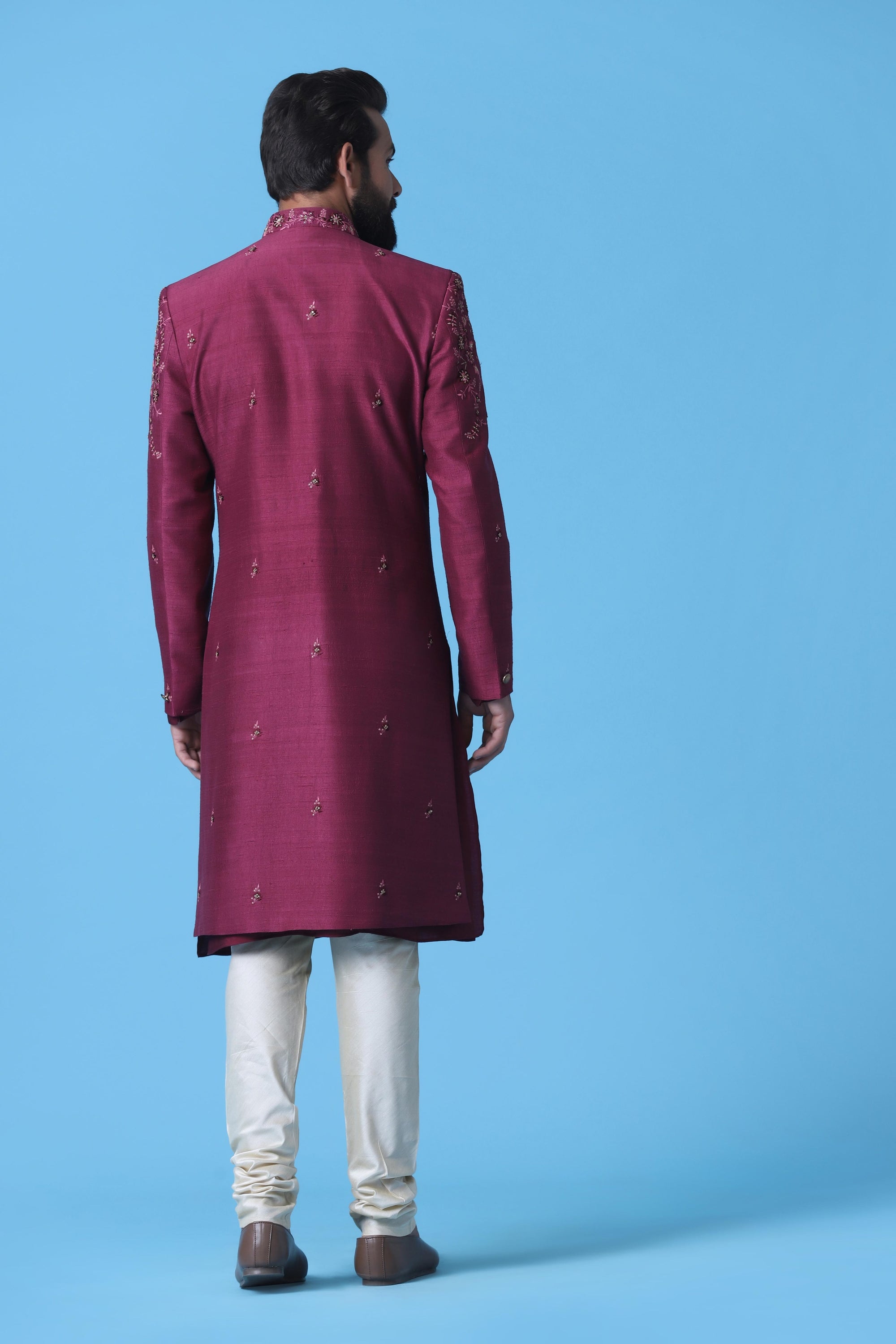 Enhance your ensemble with this maroon Indowestern, crafted from fine Raw Silk fabric. Shop Now!