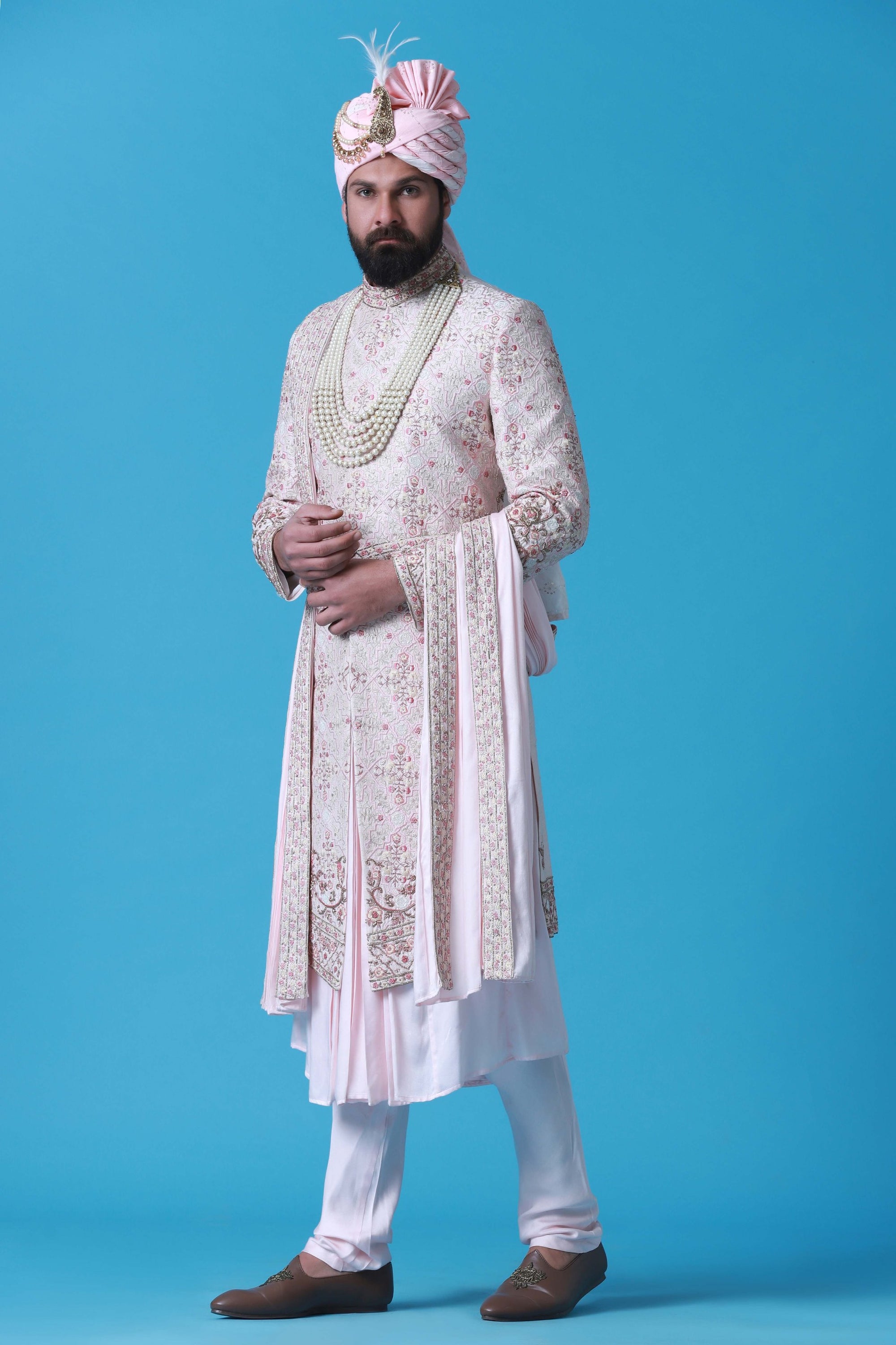 Elevate your style with this regal Sherwani crafted from fine raw silk fabric. Shop Now!
