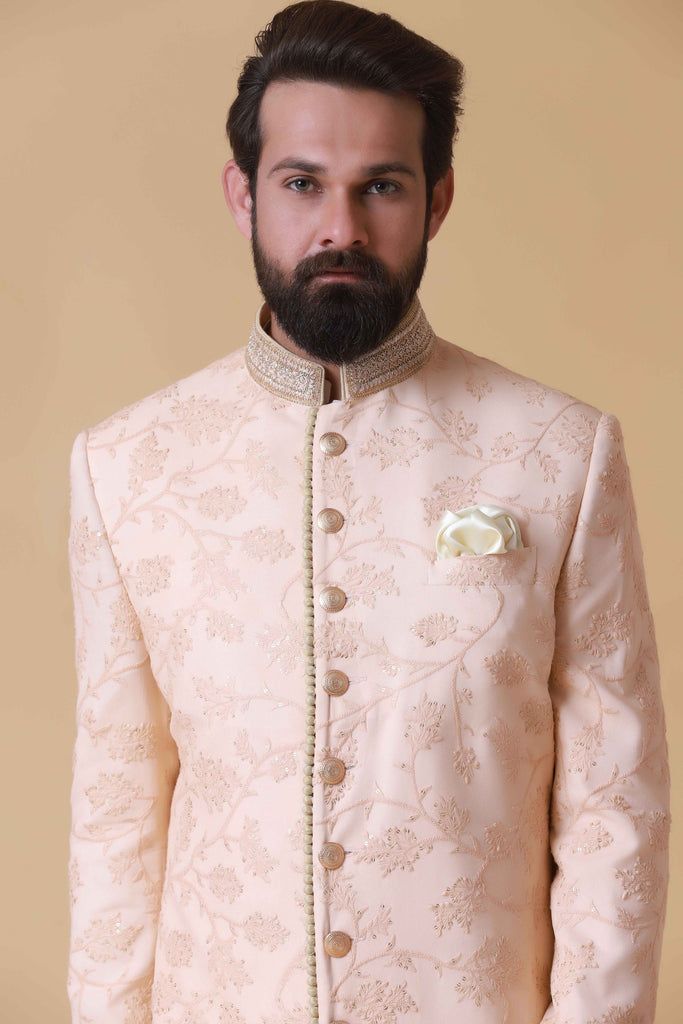 Elevate your summer wedding attire with this pink embroidered Indowestern, crafted from lightweight cotton chiffon and adorned with tonal floral embroidery.