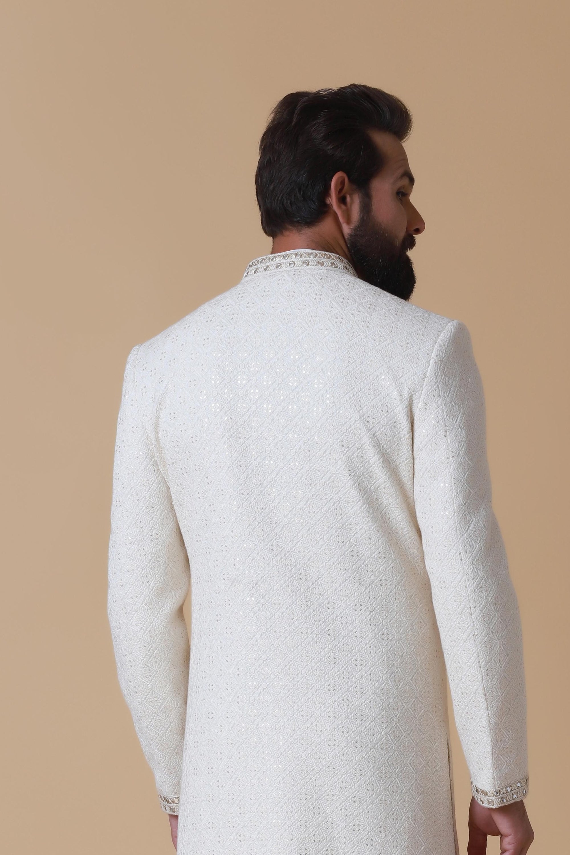 Designer Sherwani with soft colours and intricate embroidery. Shop Now!