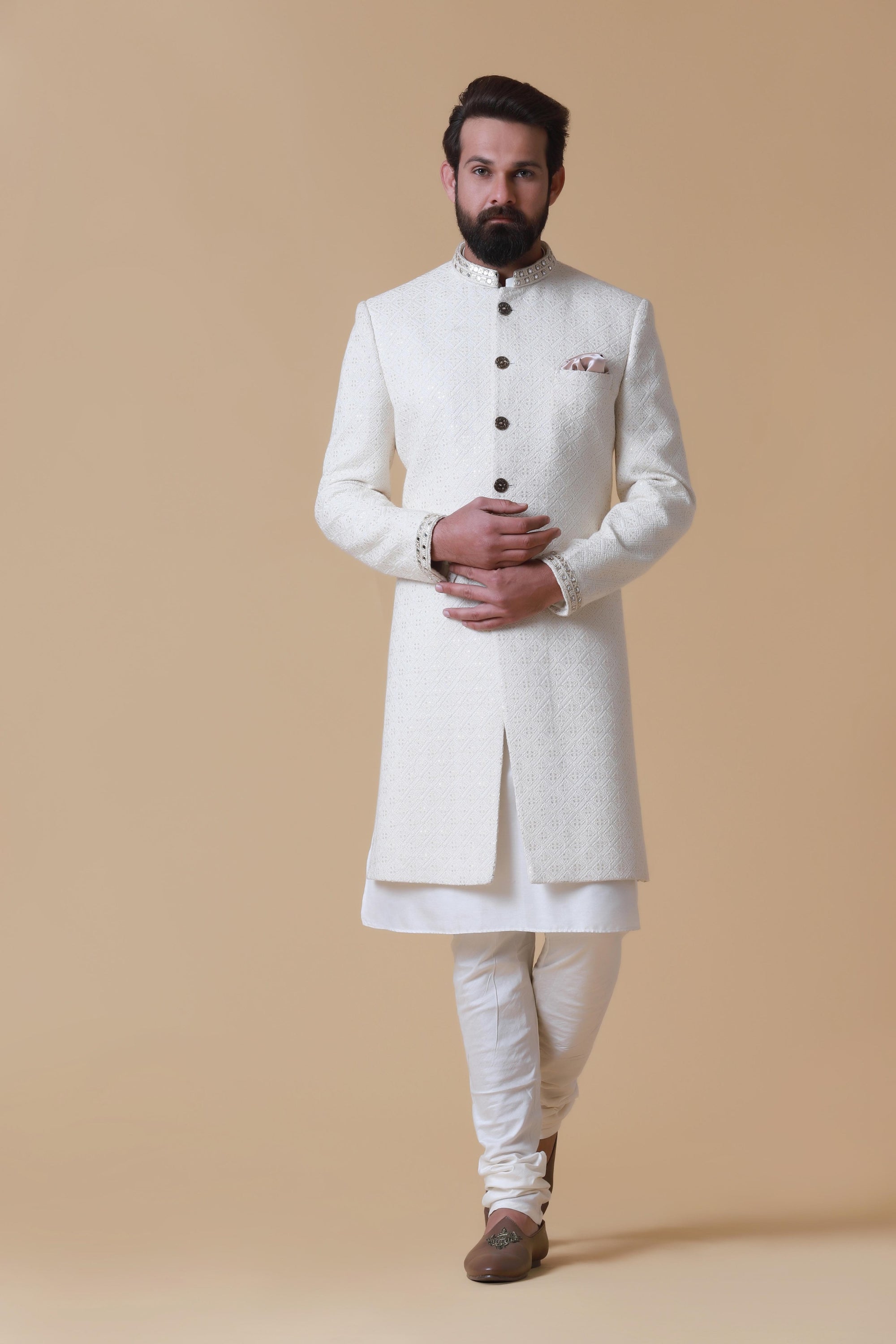 Designer Sherwani with soft colours and intricate embroidery. Shop Now!