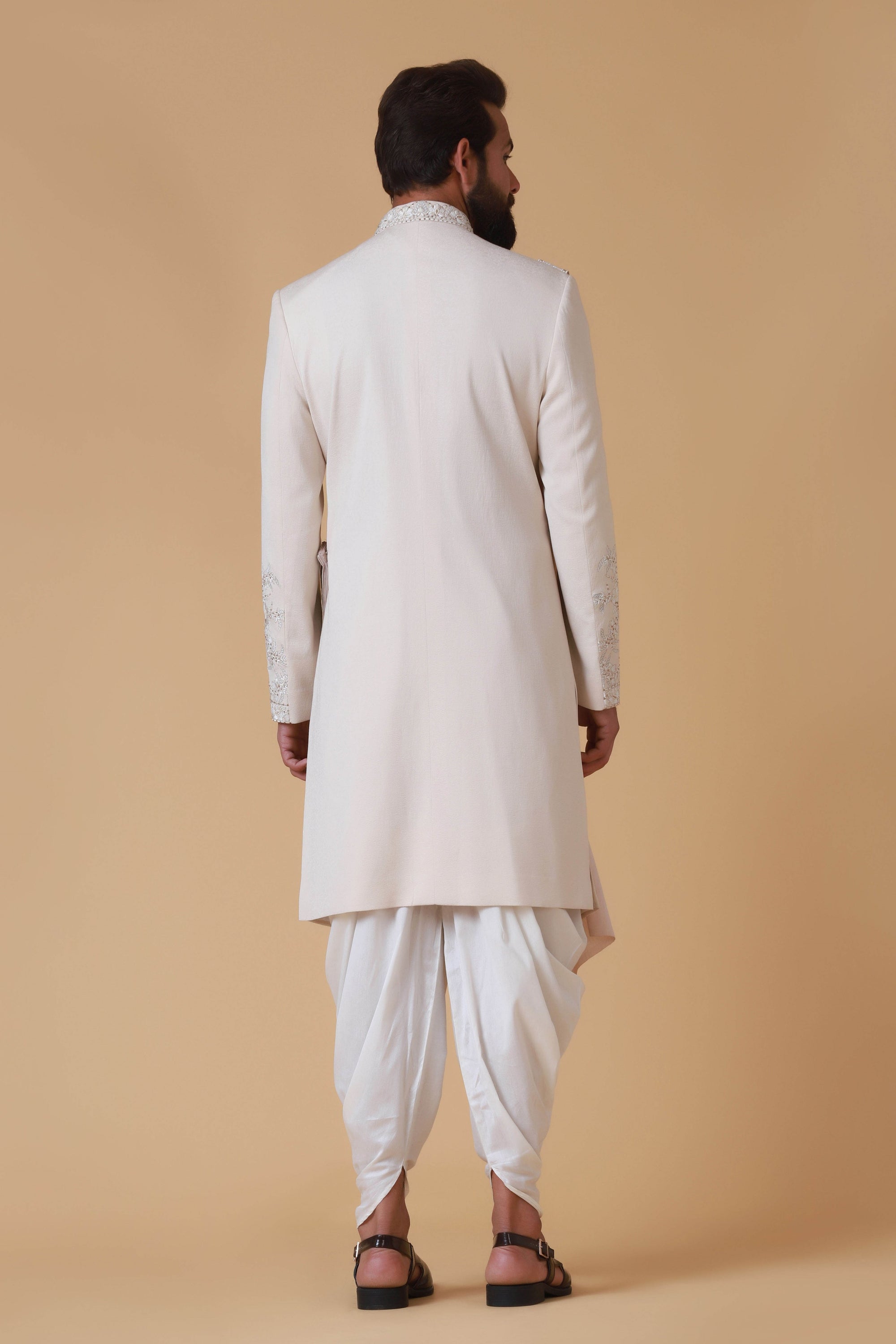 Designer Sherwani with soft colours and intricate embroidery. Shop Now!