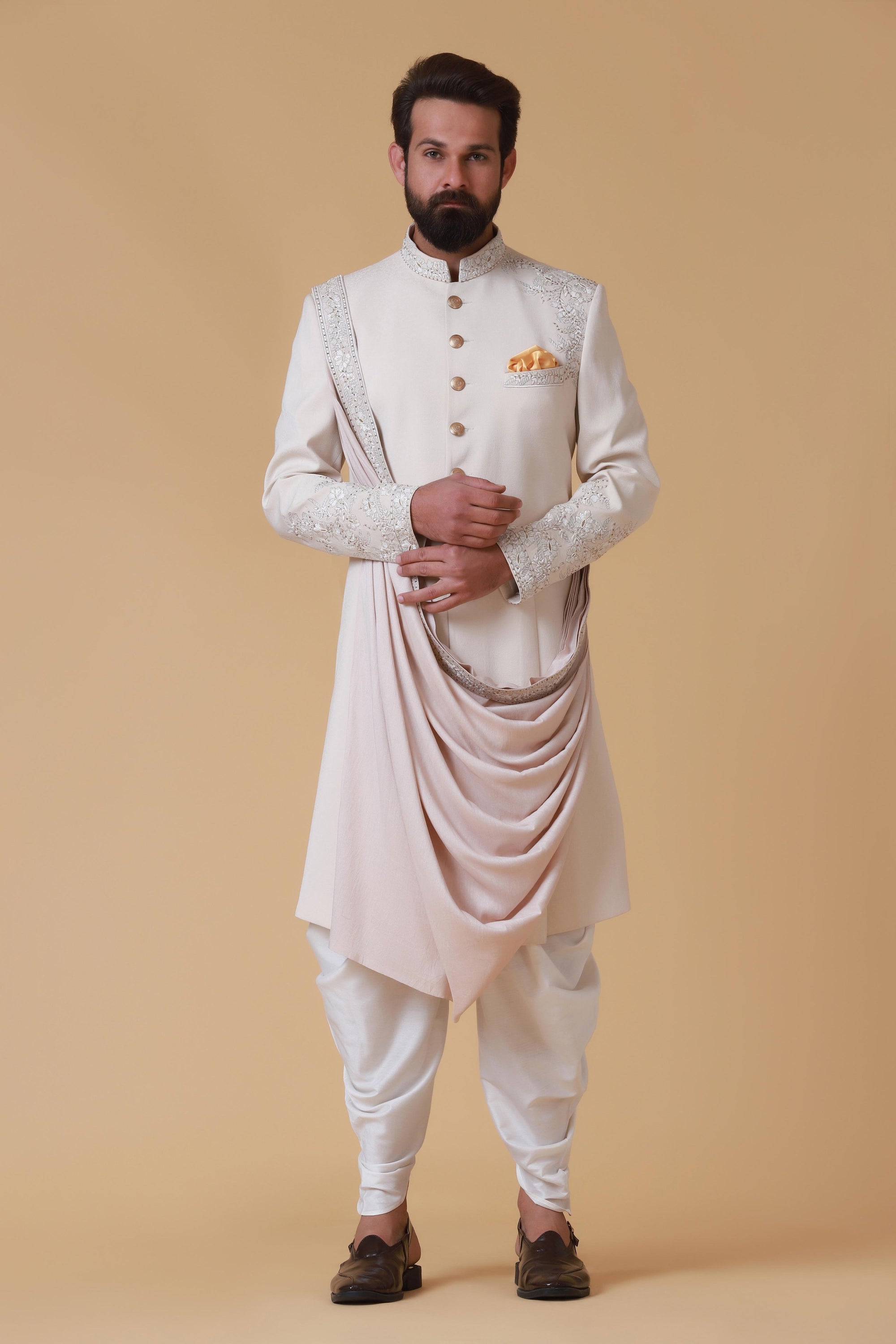 Designer Sherwani with soft colours and intricate embroidery. Shop Now!