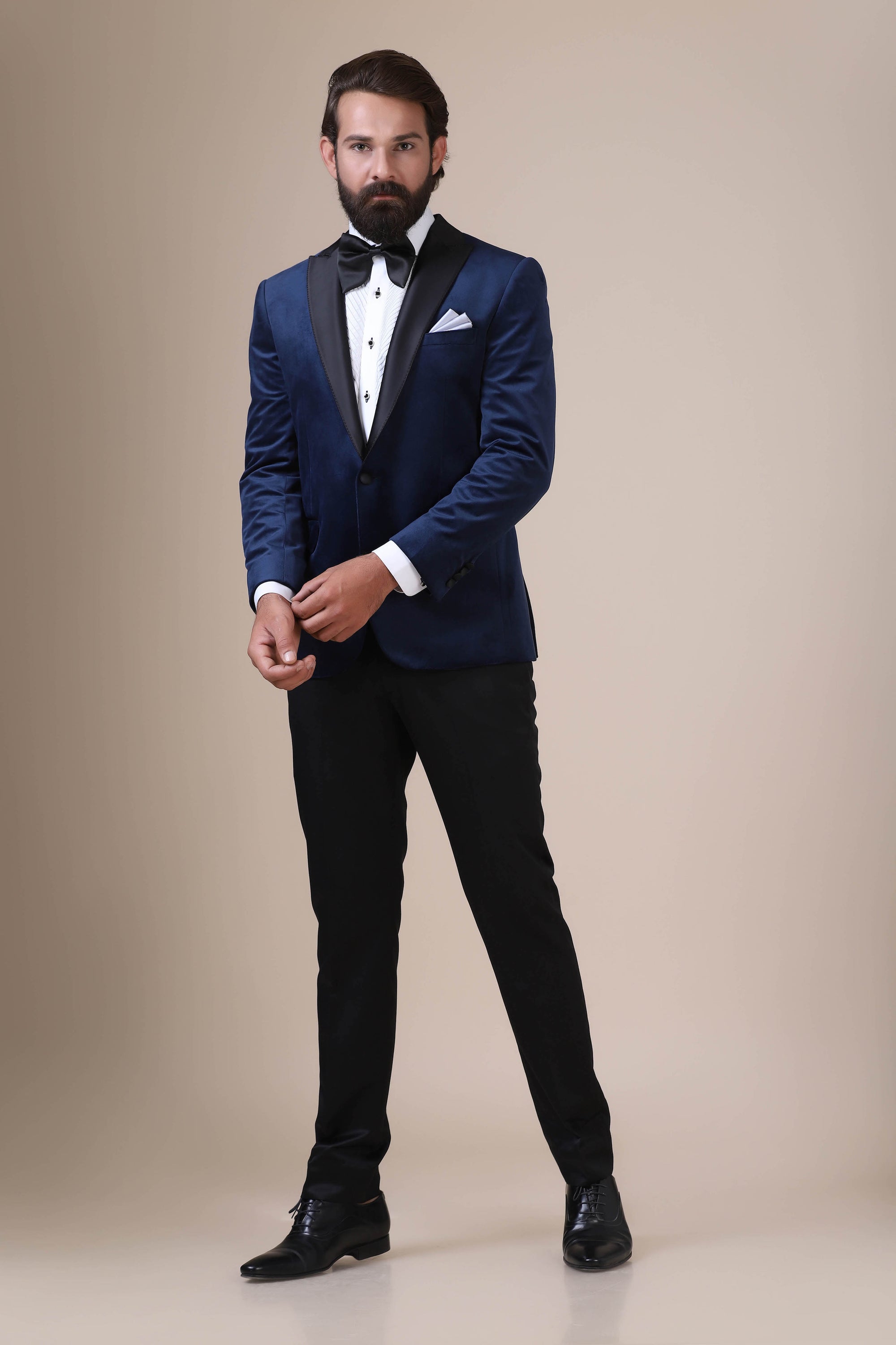 Step into sophistication with our navy velvet Tuxedo. Shop Now!