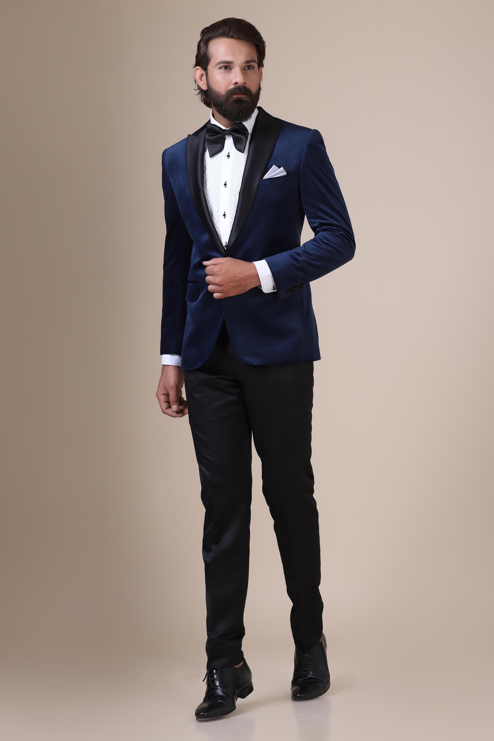 Step into sophistication with our navy velvet Tuxedo. Shop Now!