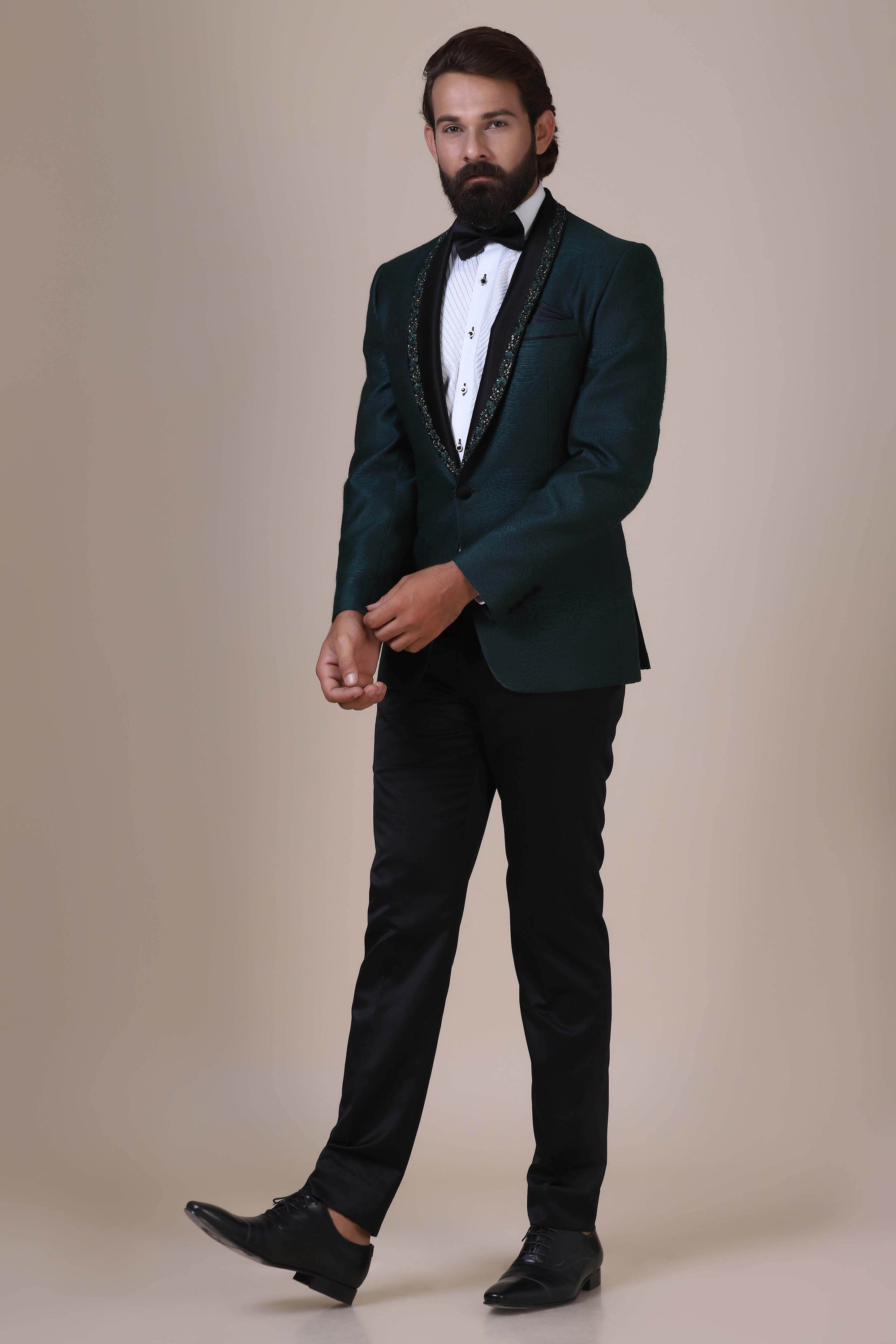 Step into elegance with Green Tuxedo. Satin shawl collar adorned with subtle embroidery. Shop Now!