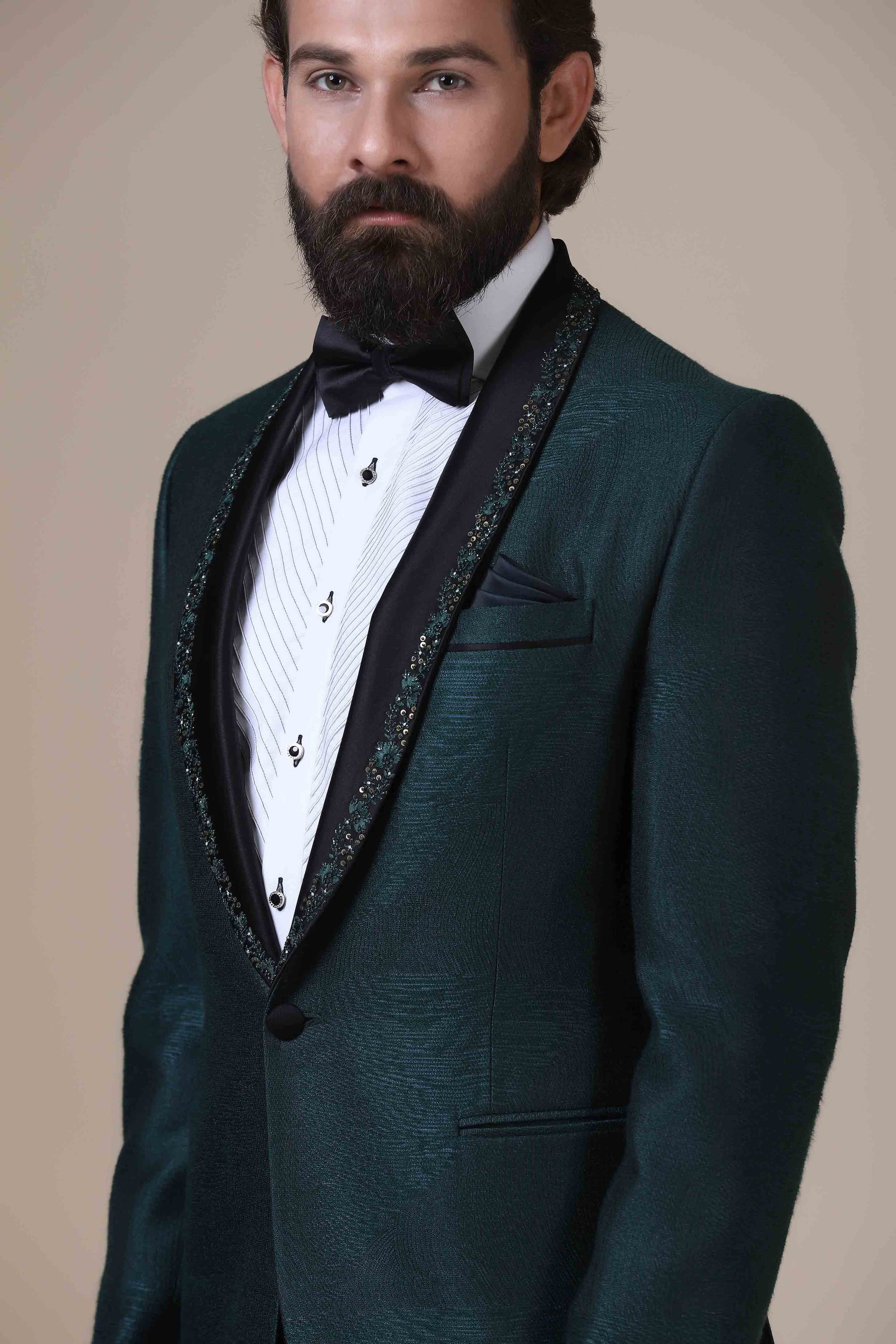 Step into elegance with Green Tuxedo. Satin shawl collar adorned with subtle embroidery. Shop Now!