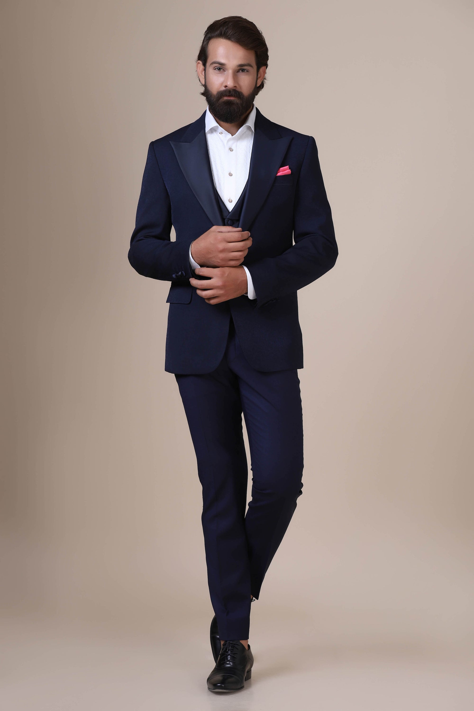 DDress with refined elegance in our Navy tuxedo. Notched lapel, single button closure. Shop Now!