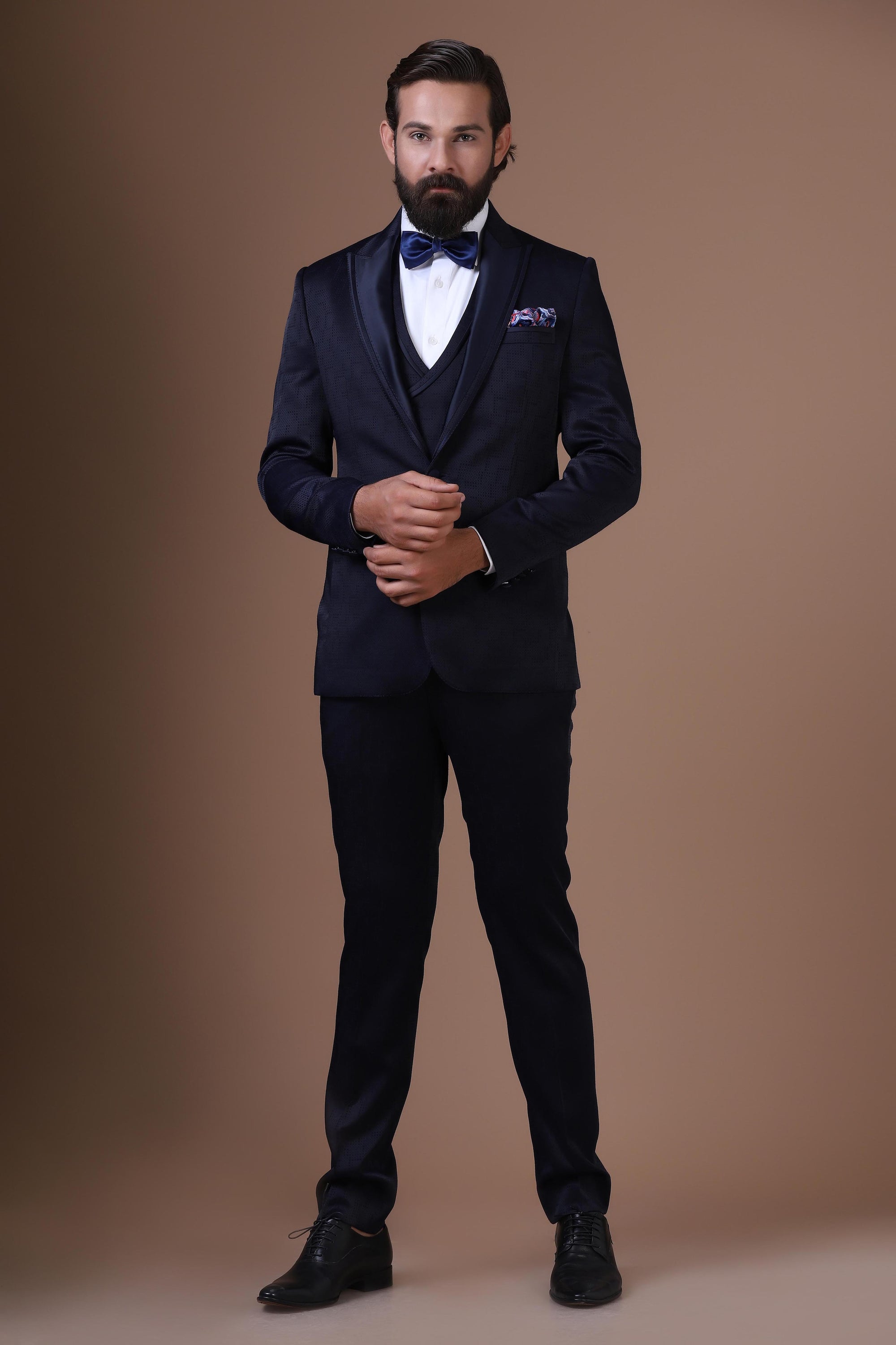 This 3-Piece tuxedo comes with a notched lapel and a single button closure. Shop Now!