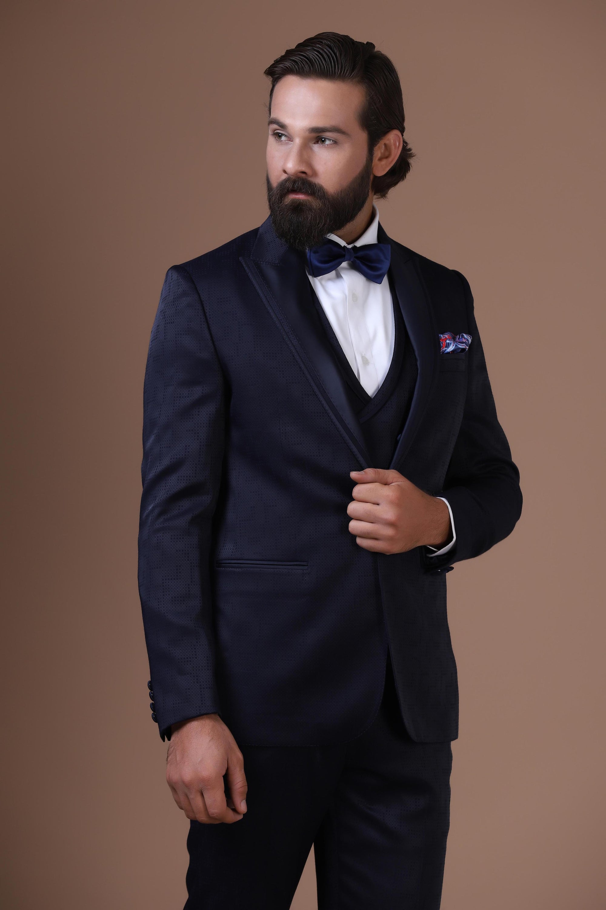 This 3-Piece tuxedo comes with a notched lapel and a single button closure. Shop Now!