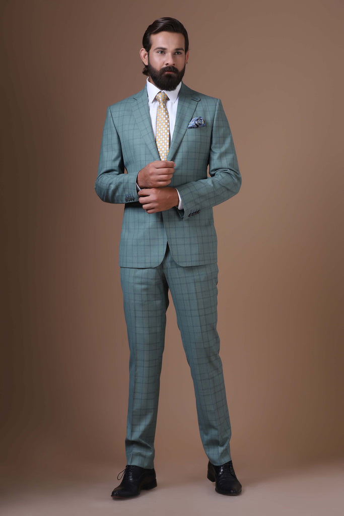 Elevate your ensemble with our two-button, notch lapel suit crafted from 100% wool fabric.
