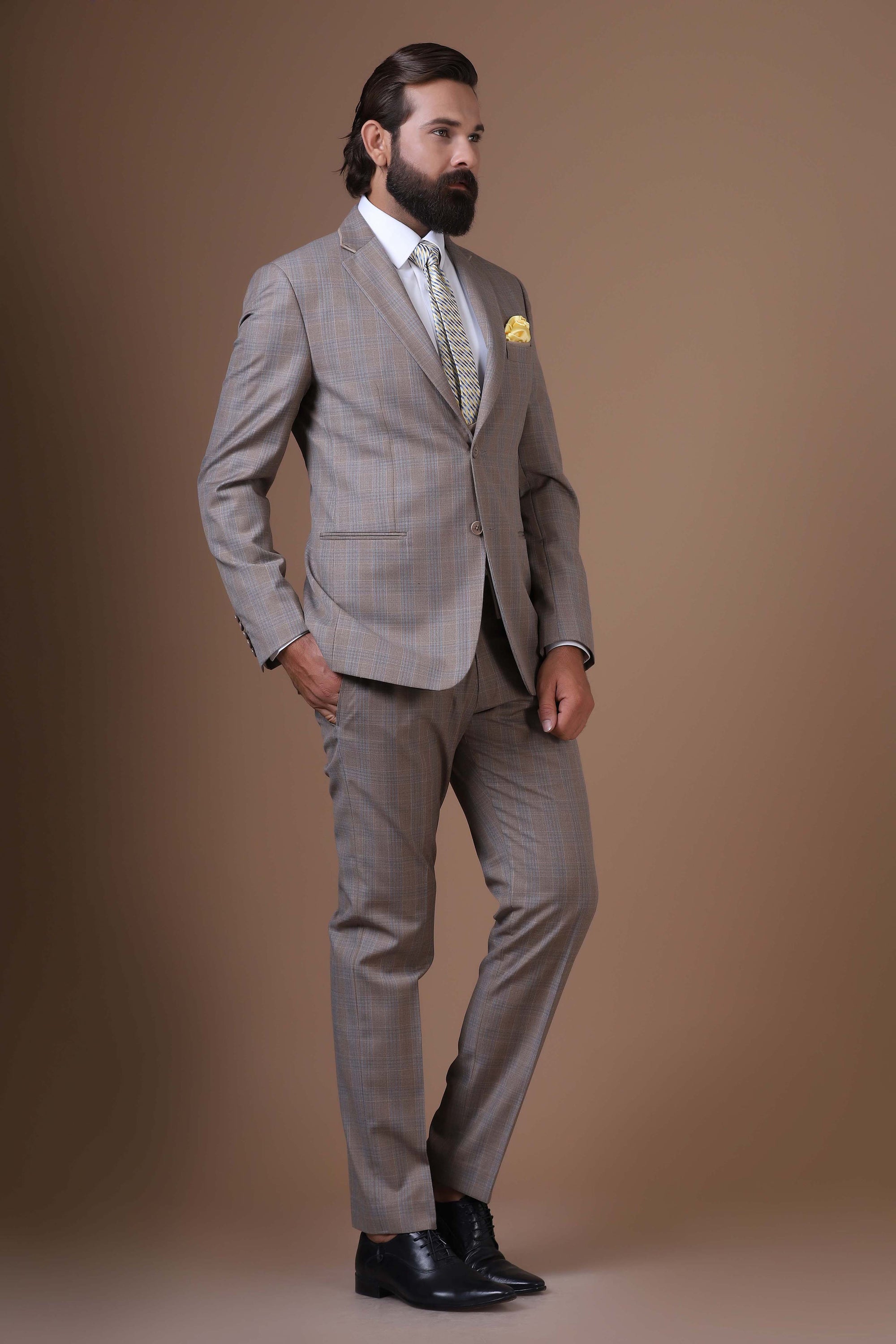 Step into sophistication with our Beige 3-Piece suit featuring a contrast waistcoat. Shop Now!
