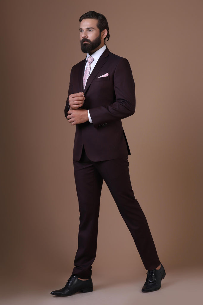 Elevate your style with our Wine Melange Wool-rich suit, exuding timeless sophistication.