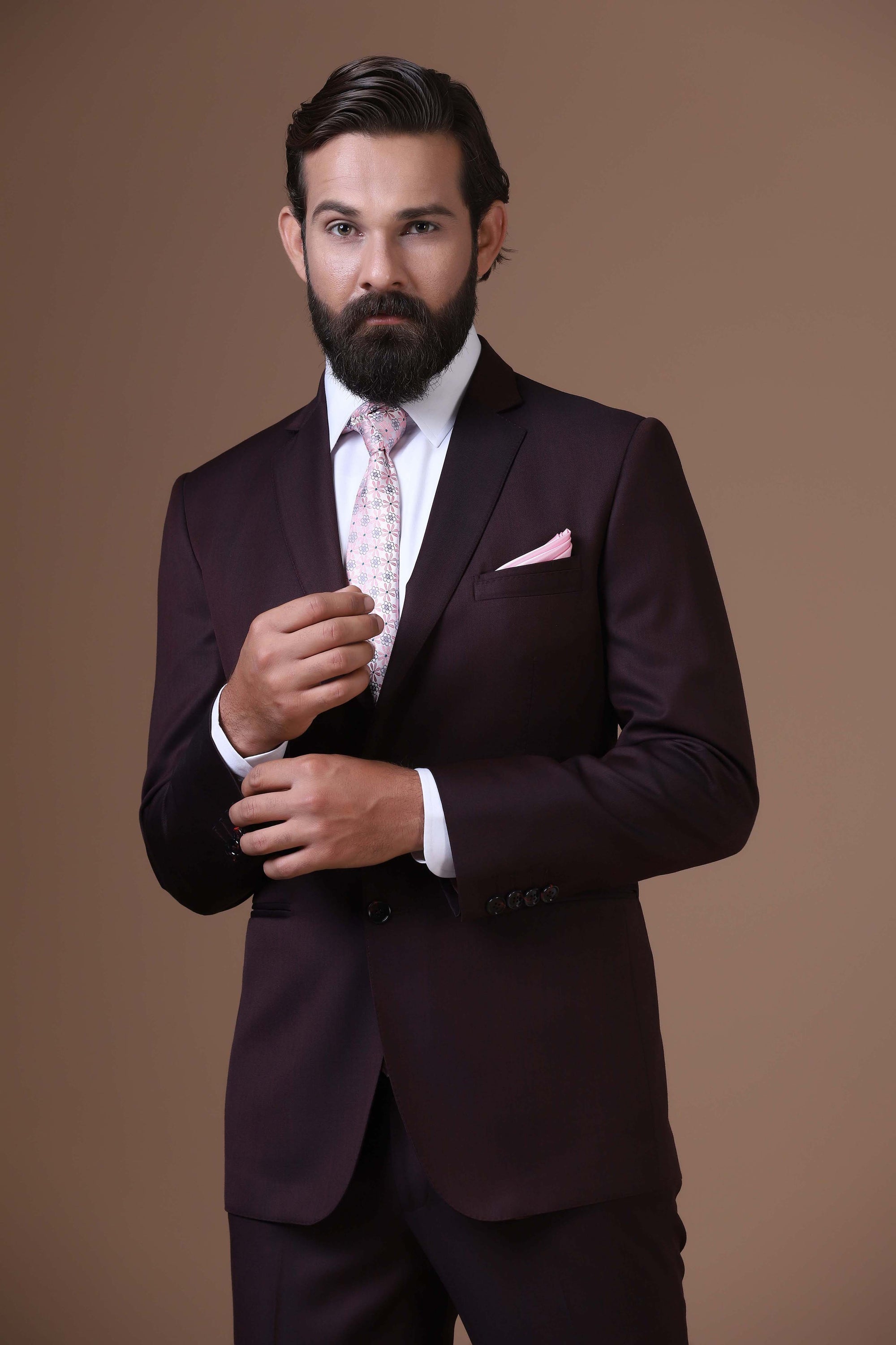 Elevate your style with our Wine Melange Wool-rich suit, exuding timeless sophistication. Shop Now!