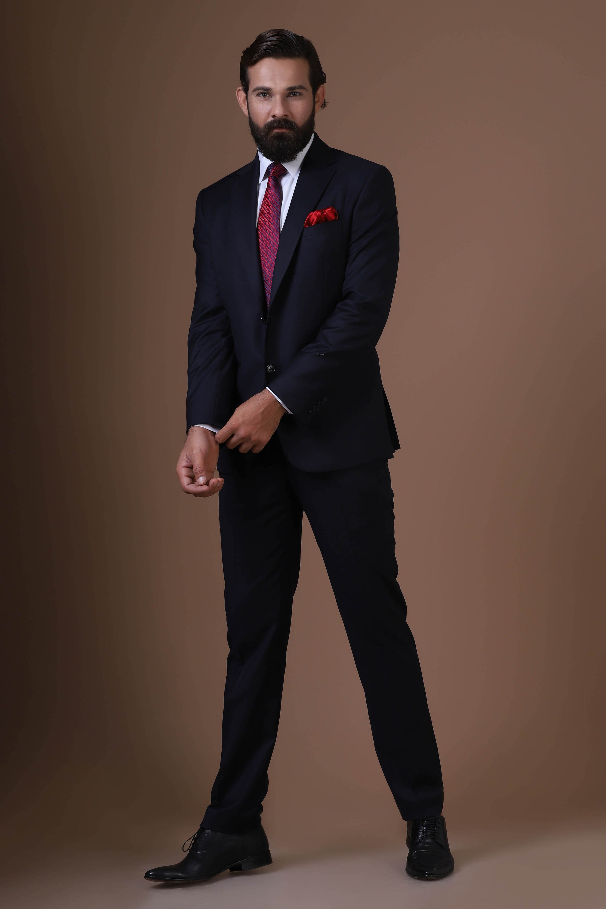 Elevate your style with classic Navy Blue Suit, crafted from luxurious wool-rich fabric. Shop Now!