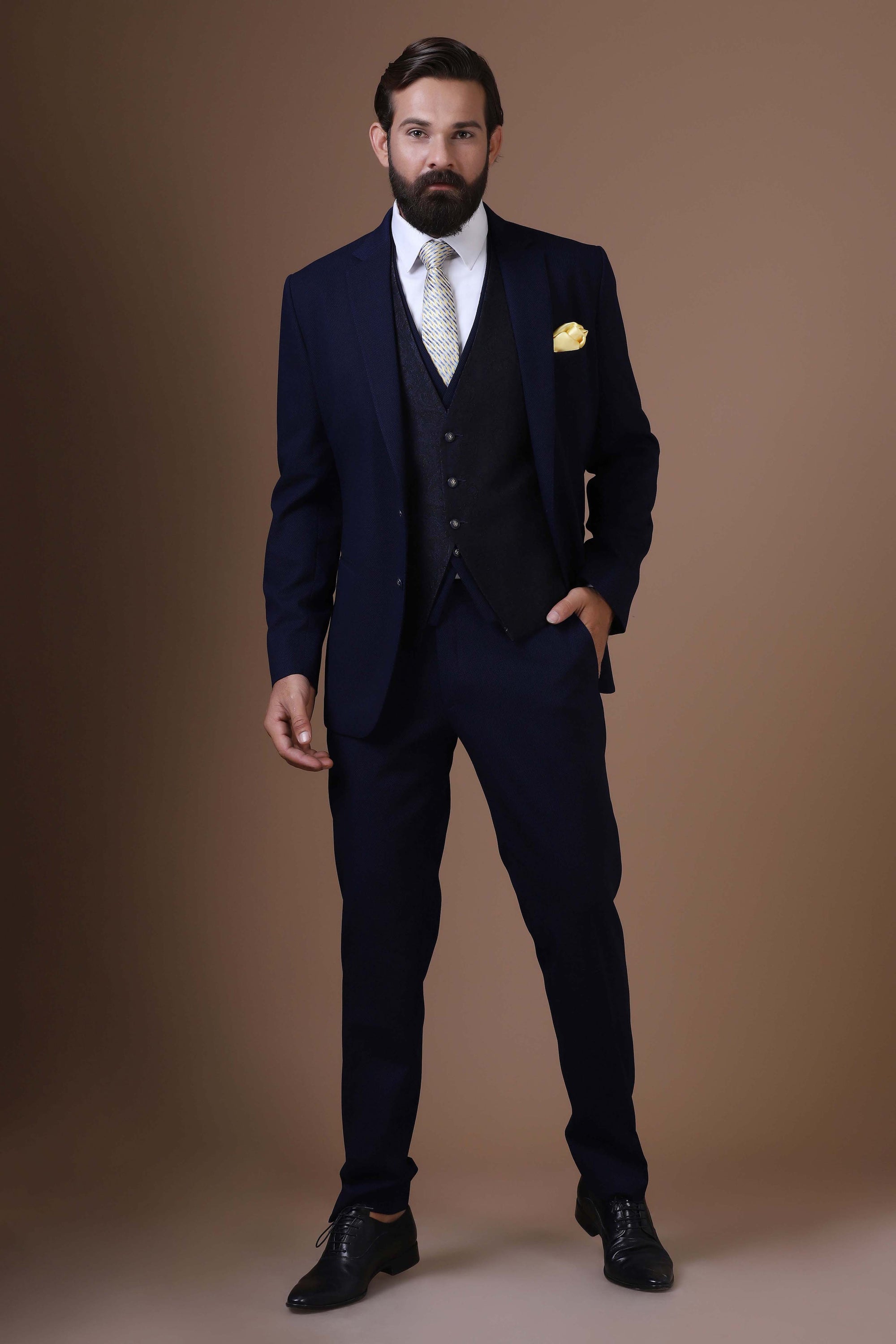 Elevate your style with our 3 Piece suit featuring a contrast jacquard waistcoat. Shop Now!