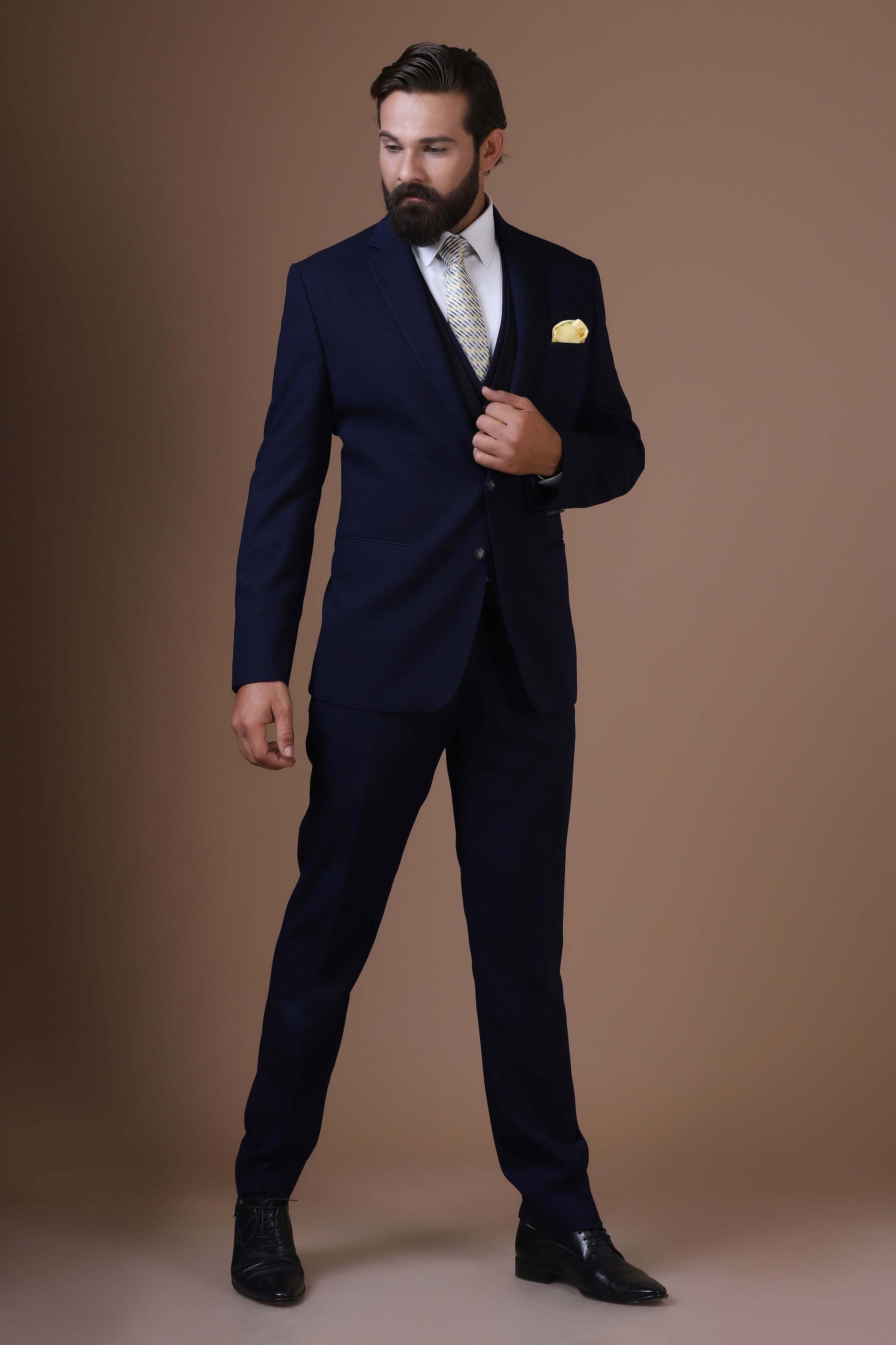 Elevate your style with our 3 Piece suit featuring a contrast jacquard waistcoat. Shop Now!