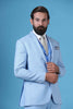 Elevate your style with this 3-piece suit featuring a printed waistcoat with a peak lapel. Single button closure, crafted from light blue wool-rich fabric.