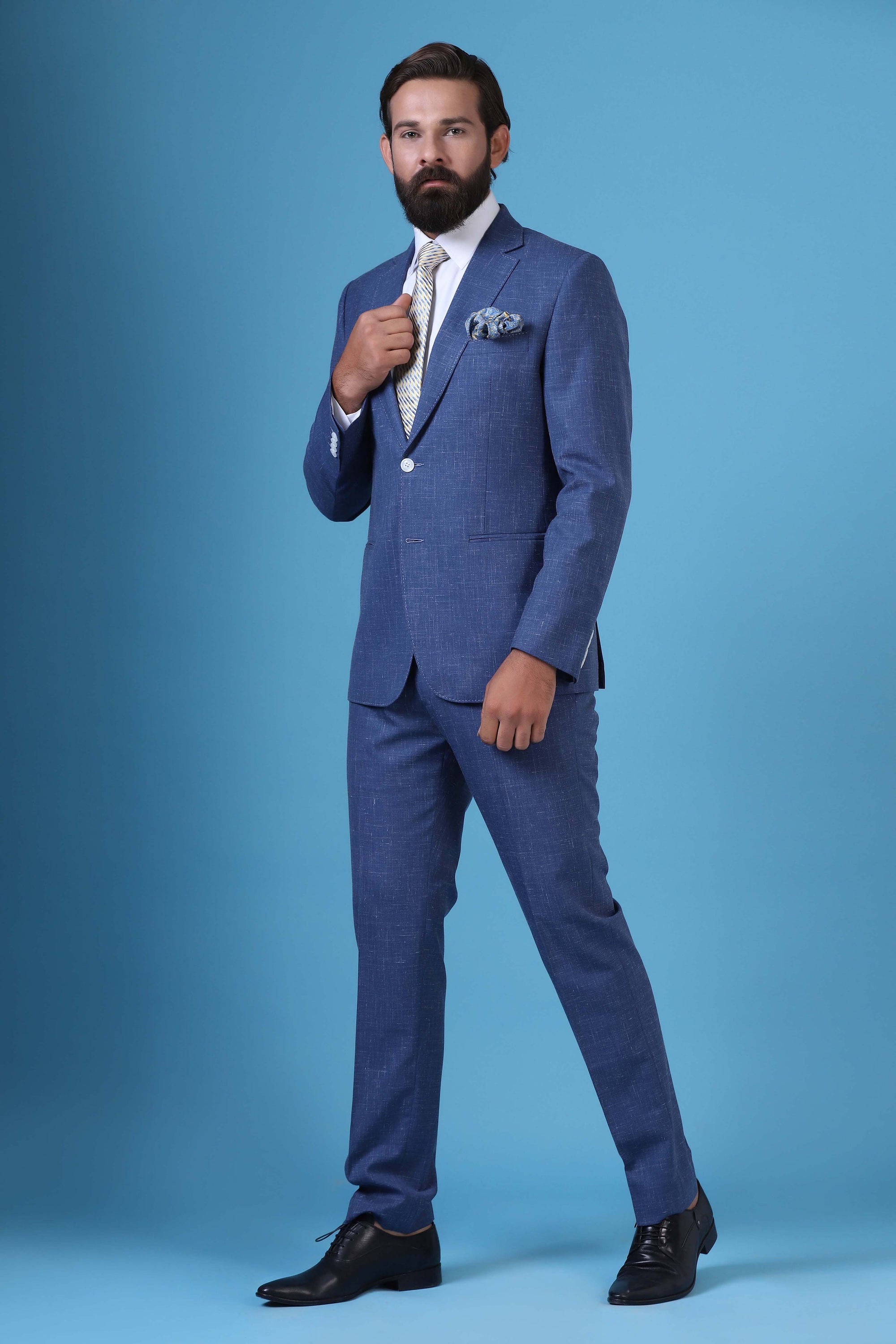 Elevate your summer style with this linen, wool, and silk blend suit. Shop Now!