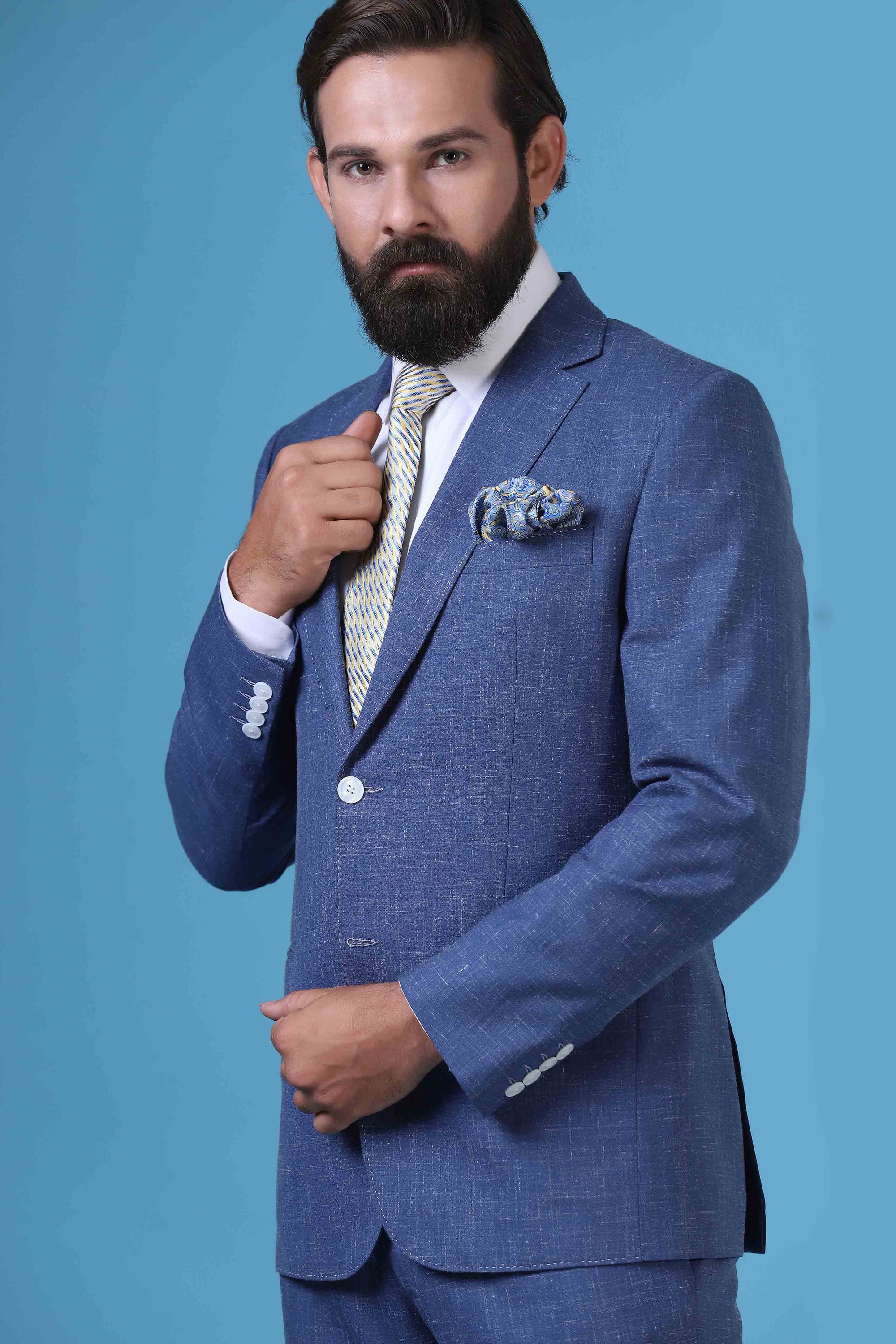 Elevate your summer style with this linen, wool, and silk blend suit. Shop Now!