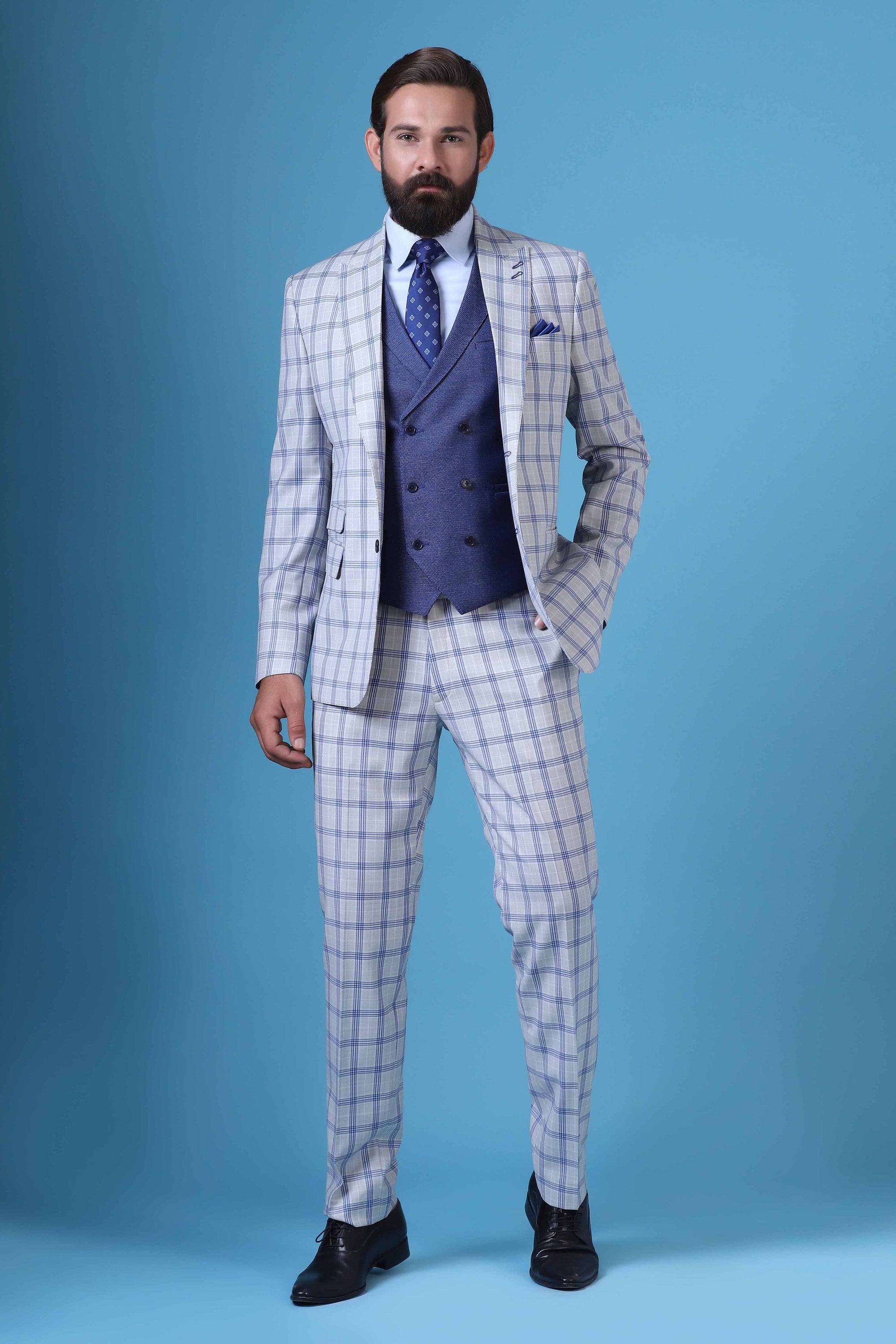 Elevate your style with our 3 Piece suit featuring a contrast double-breasted waistcoat. Shop Now!