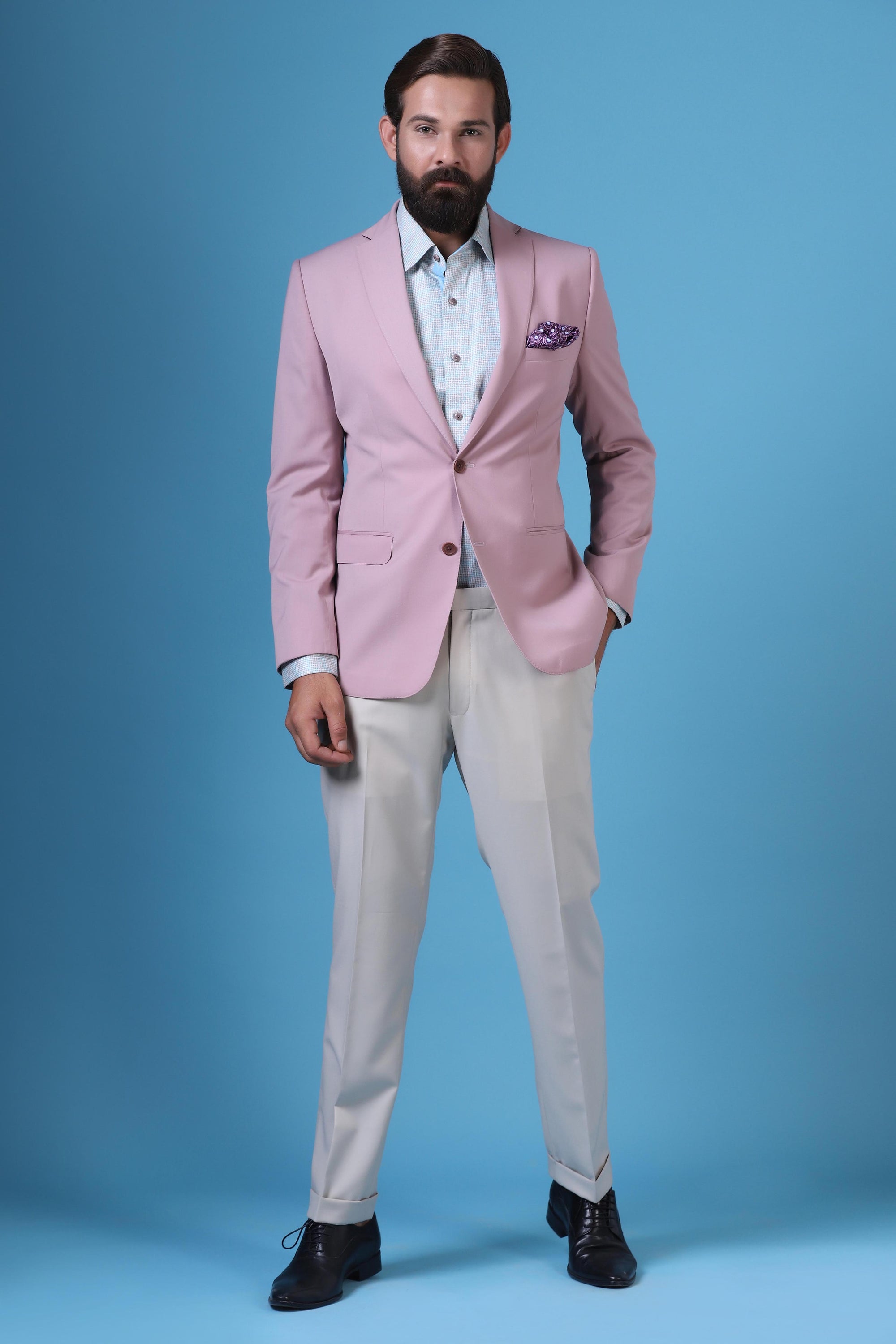Step into elegance with our soft pink blazer and beige trousers combination. Shop Now!