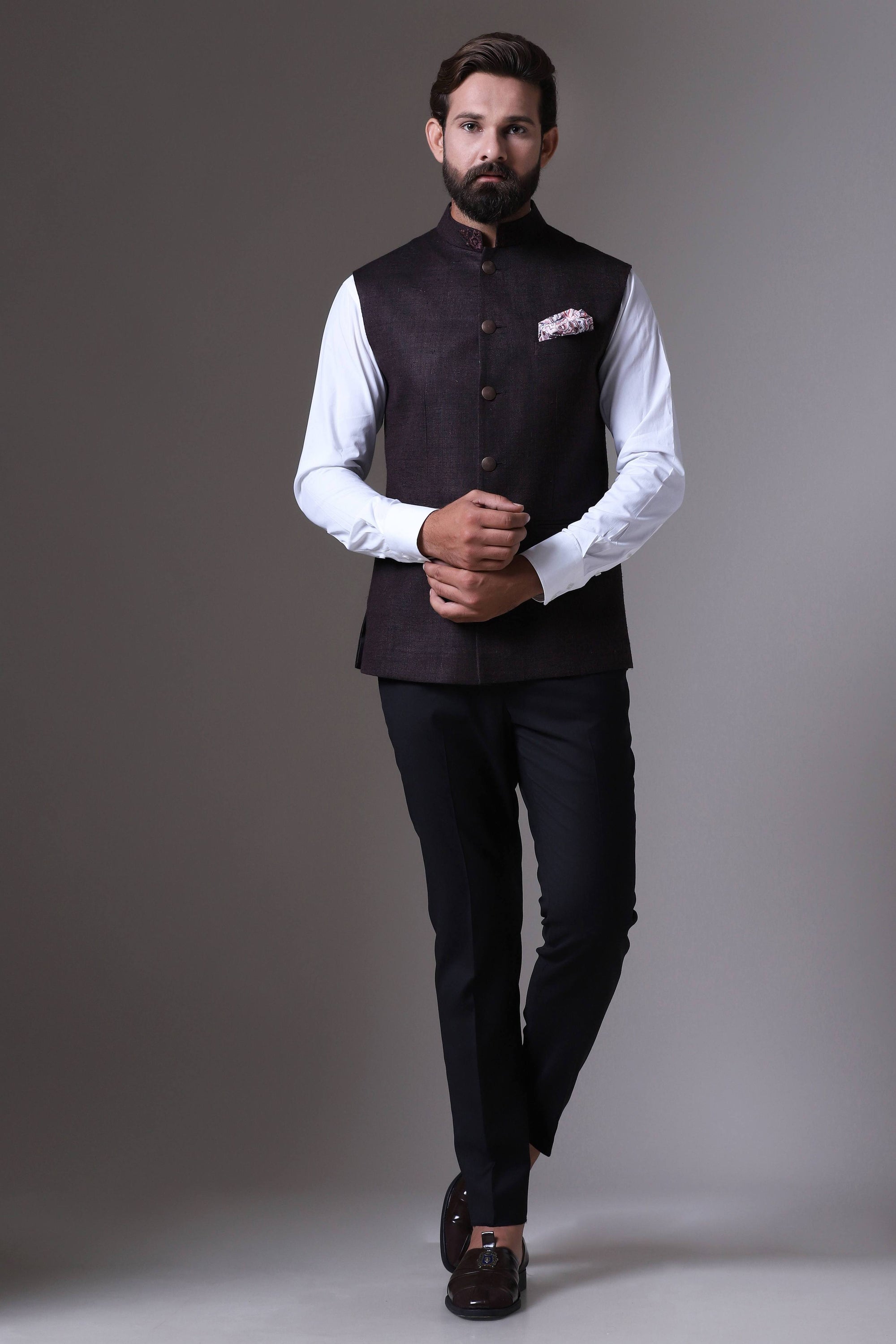 This classic brown Nehru Jacket is made using handloom silk fabric. Shop Now!