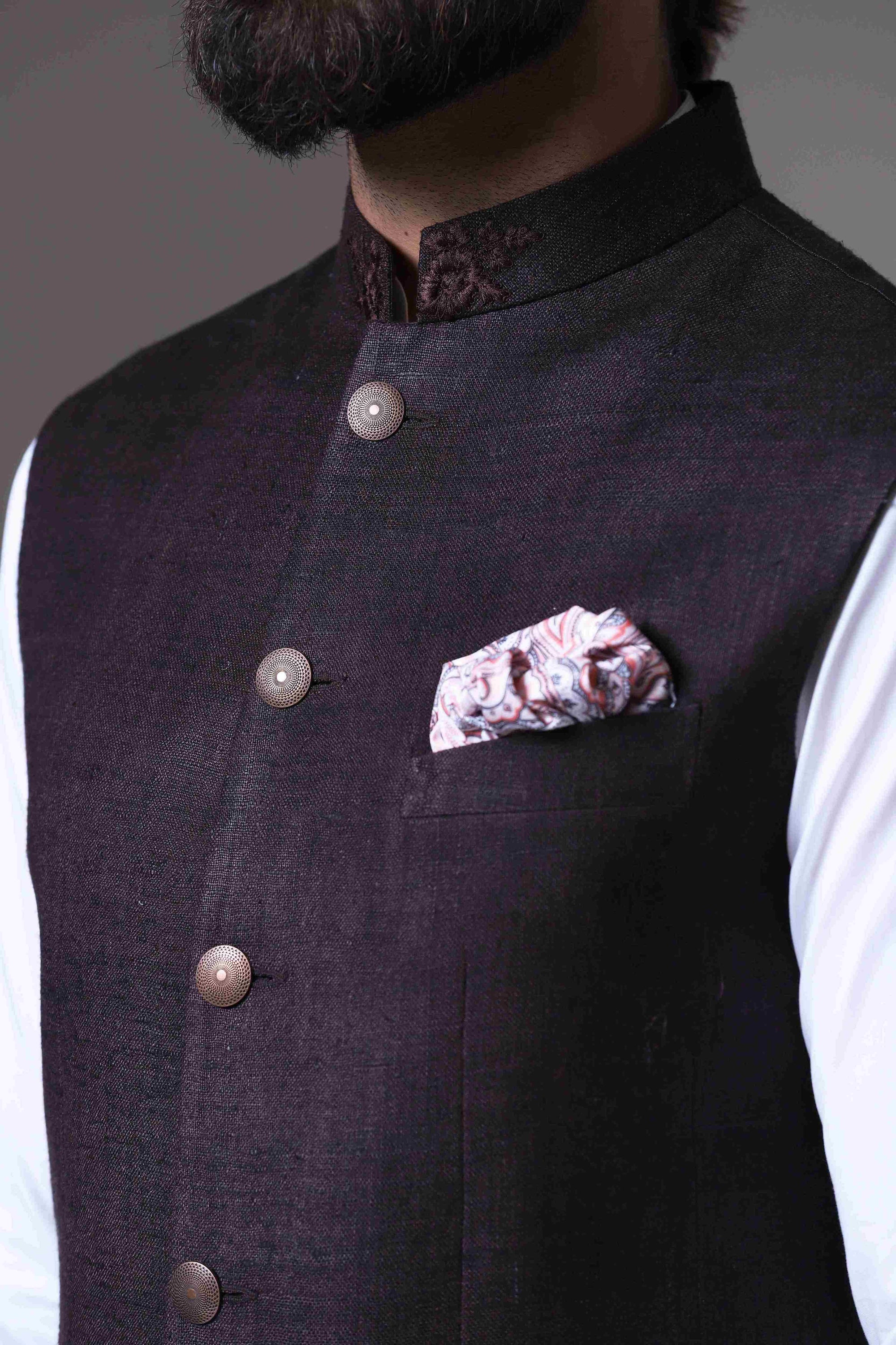 This classic brown Nehru Jacket is made using handloom silk fabric. Shop Now!