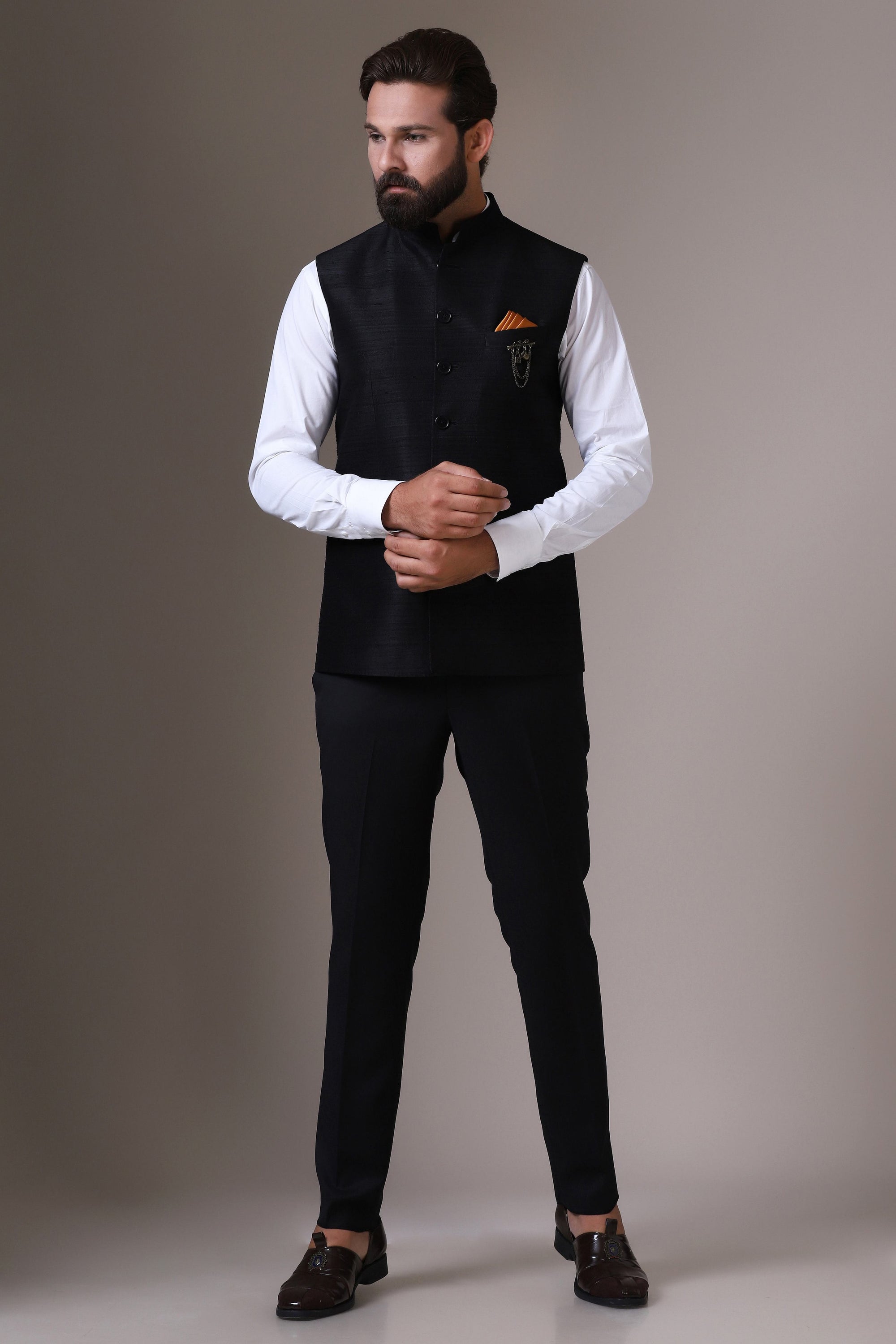 This vibrant red Nehru Jacket is made using handloom silk fabric. Shop Now!