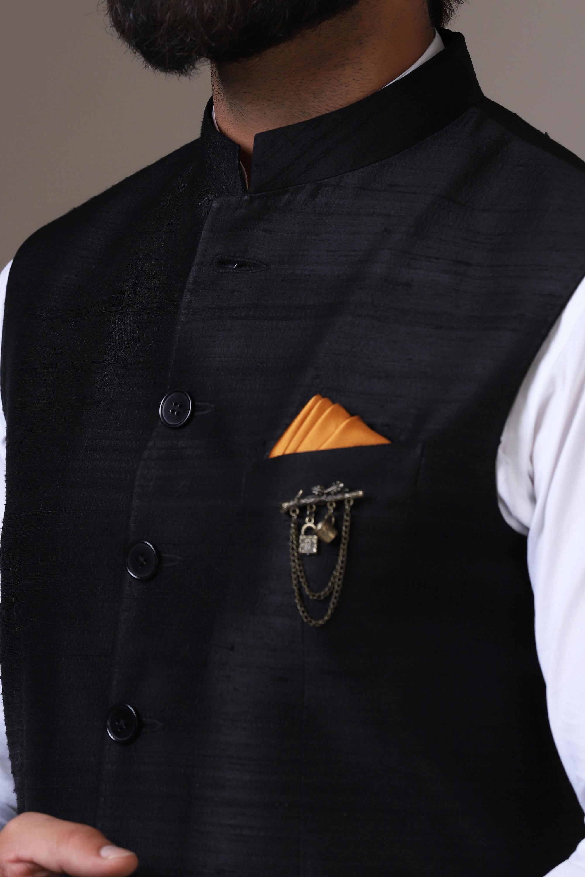This vibrant red Nehru Jacket is made using handloom silk fabric. Shop Now!