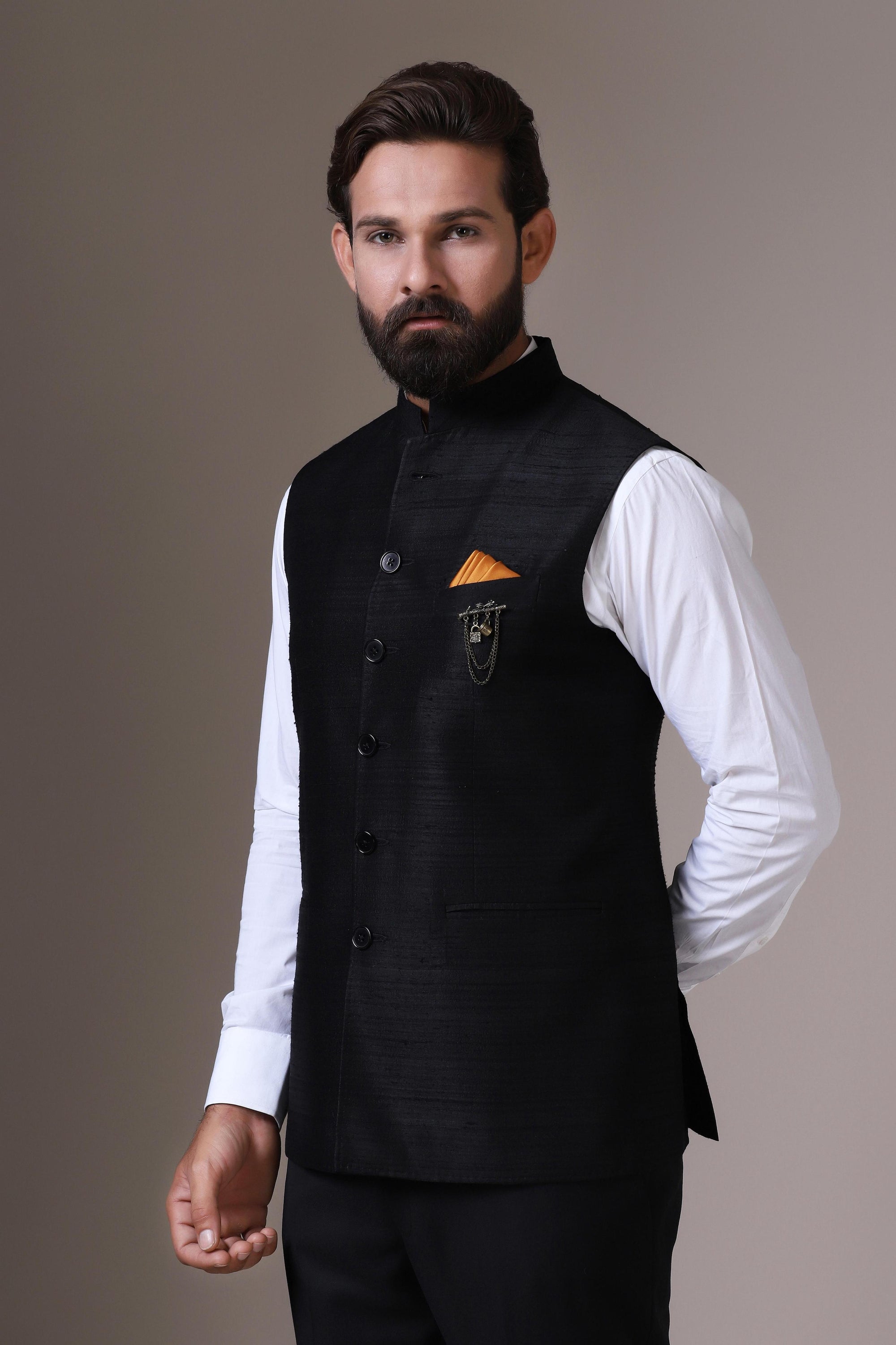 This vibrant red Nehru Jacket is made using handloom silk fabric. Shop Now!
