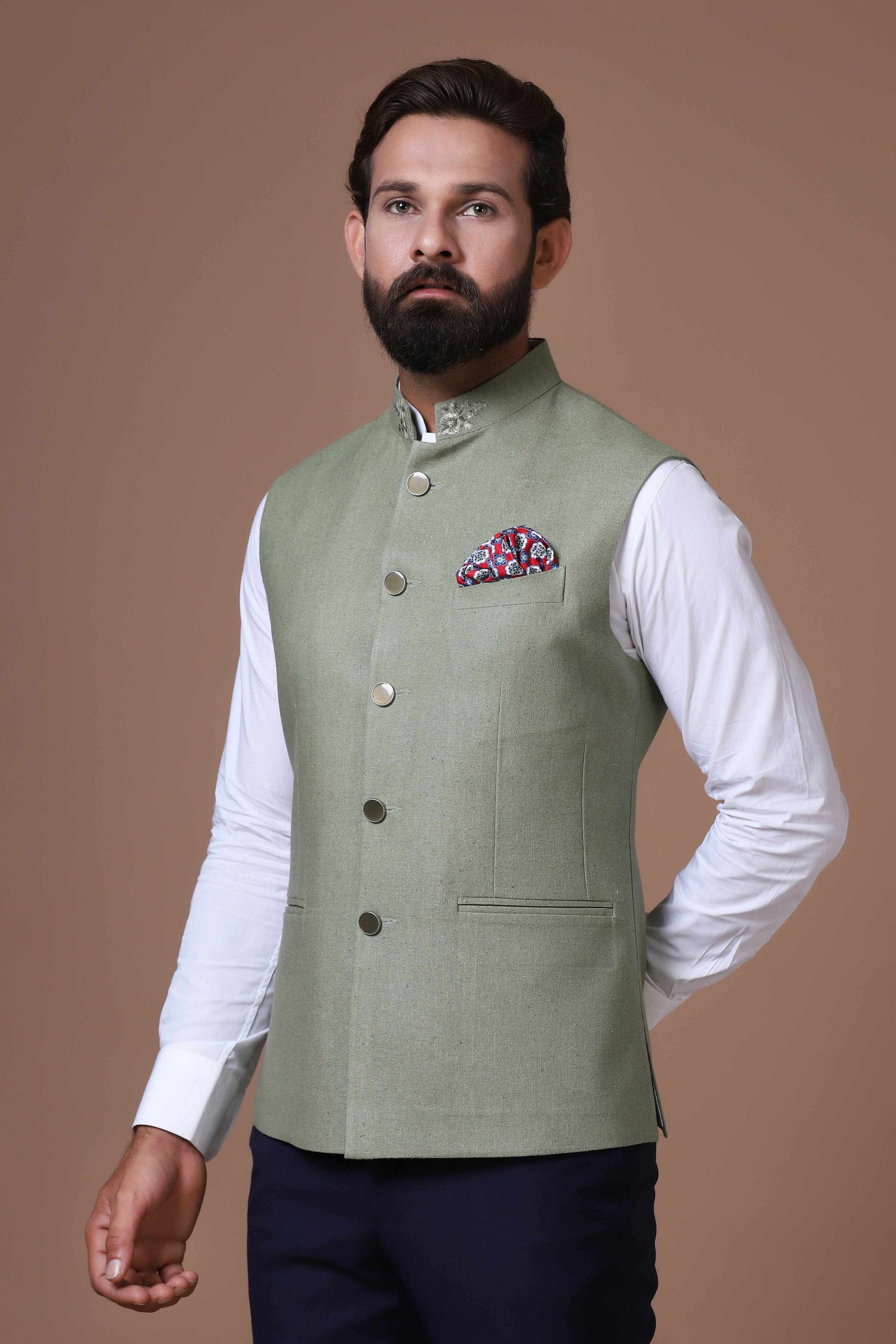 This classic Green Nehru Jacket is made using handloom silk fabric. Shop Now!