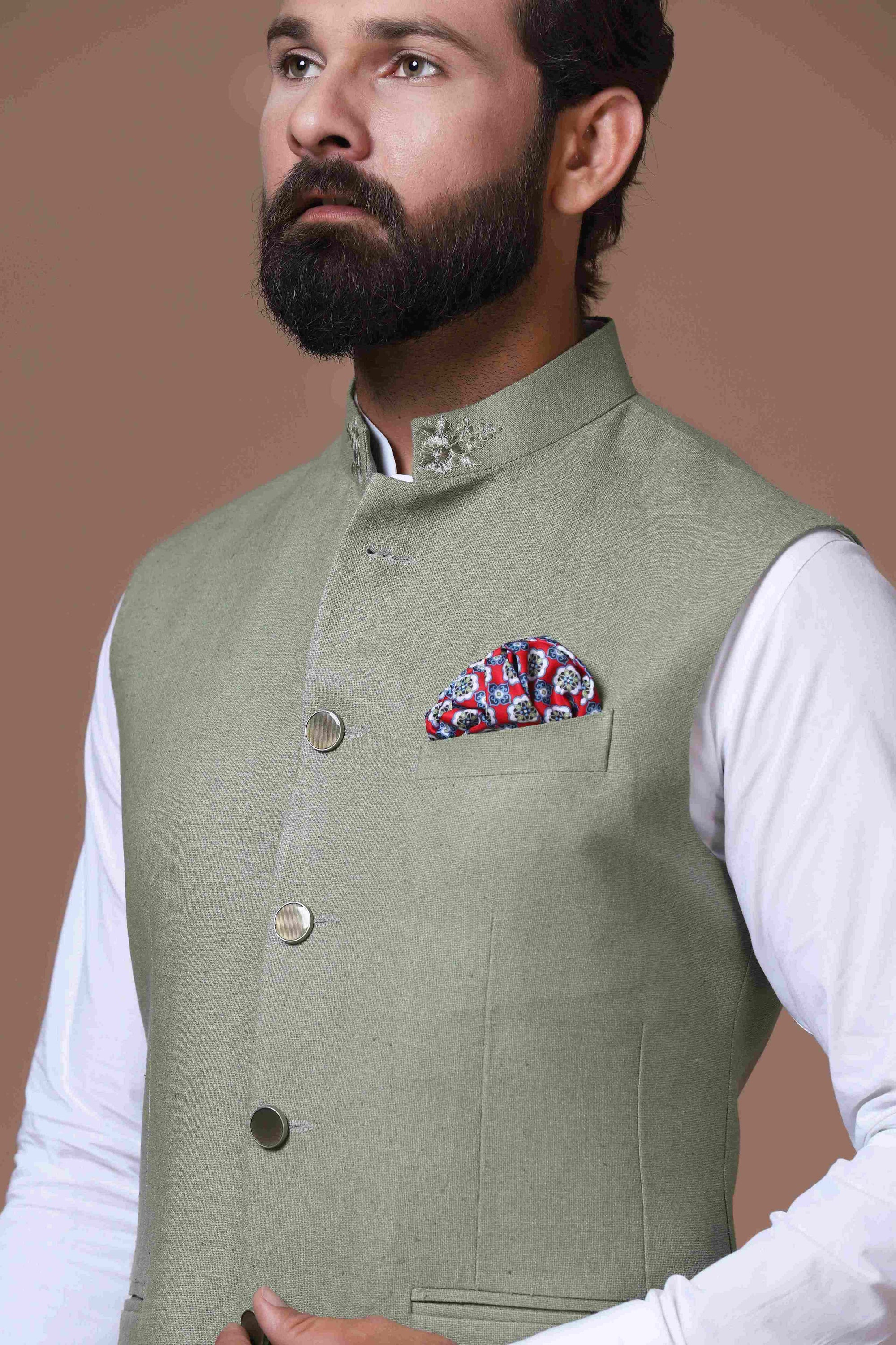 This classic Green Nehru Jacket is made using handloom silk fabric. Shop Now!