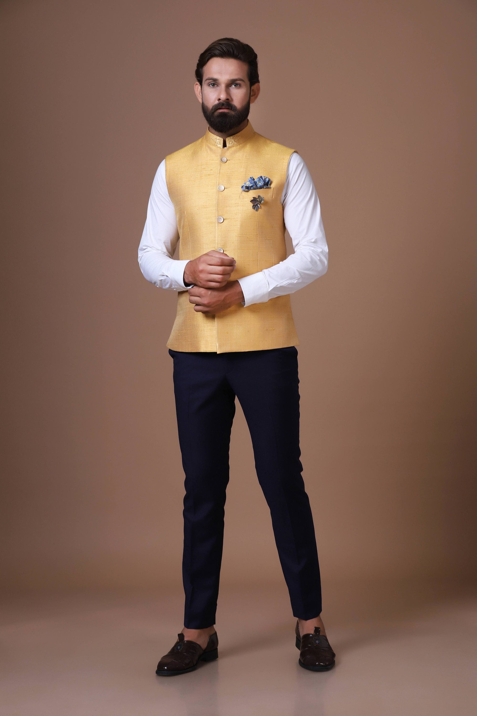 This Yellow Nehru Jacket is made using handloom raw-silk fabric. Shop Now!
