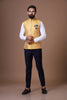 This Yellow Nehru Jacket is made using handloom raw-silk fabric. Shop Now!