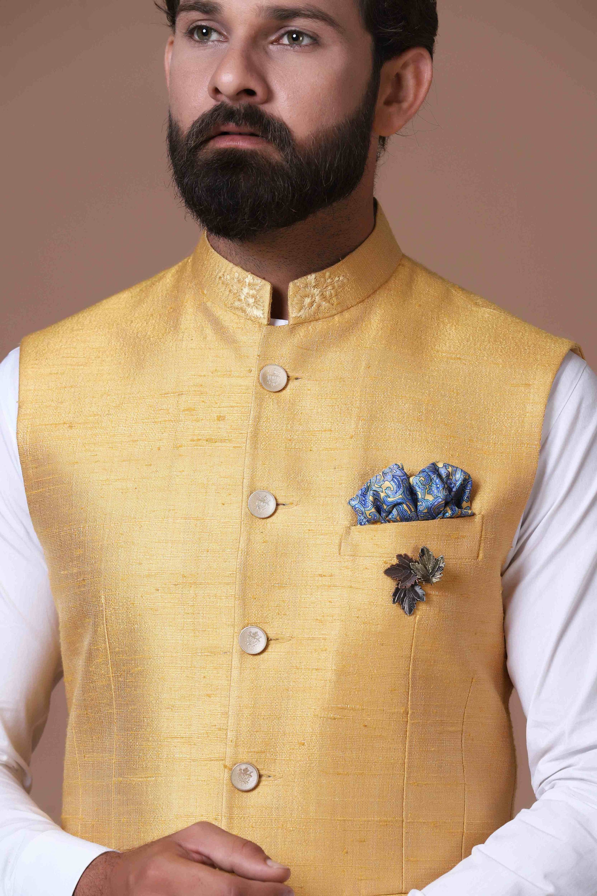 This Yellow Nehru Jacket is made using handloom raw-silk fabric. Shop Now!