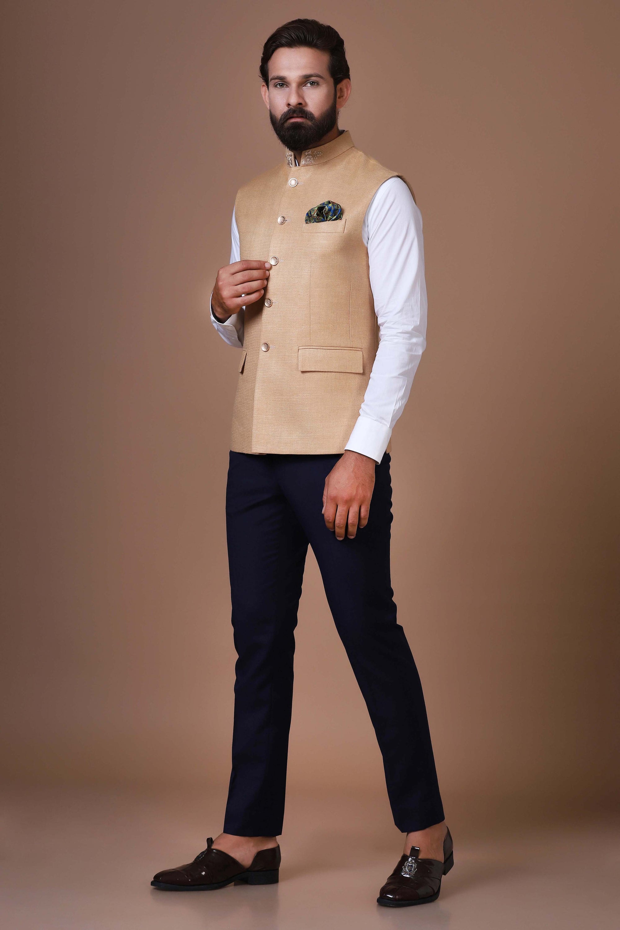 This classic white Nehru Jacket is made using handloom silk fabric. Shop Now!