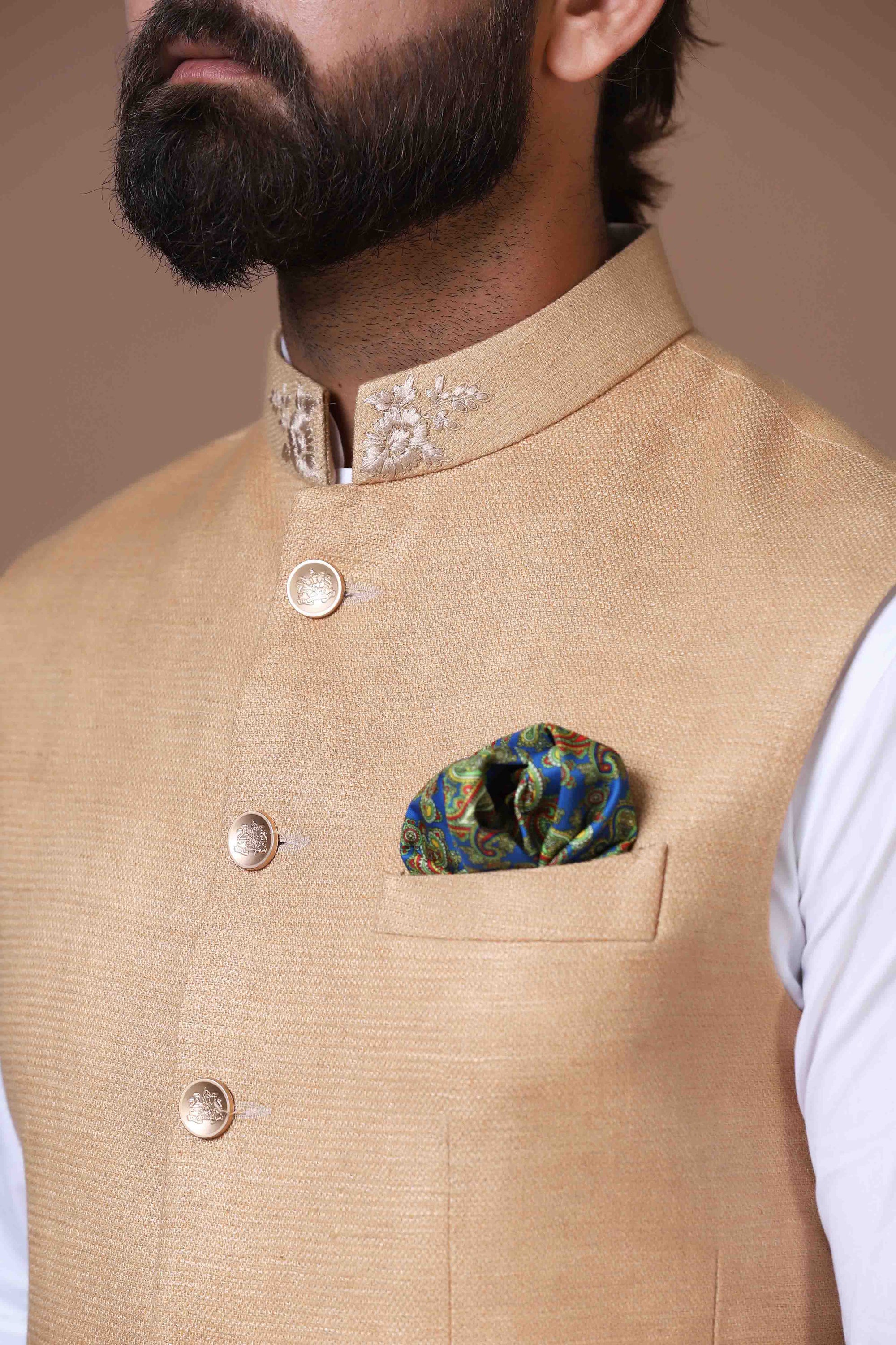 This classic white Nehru Jacket is made using handloom silk fabric. Shop Now!