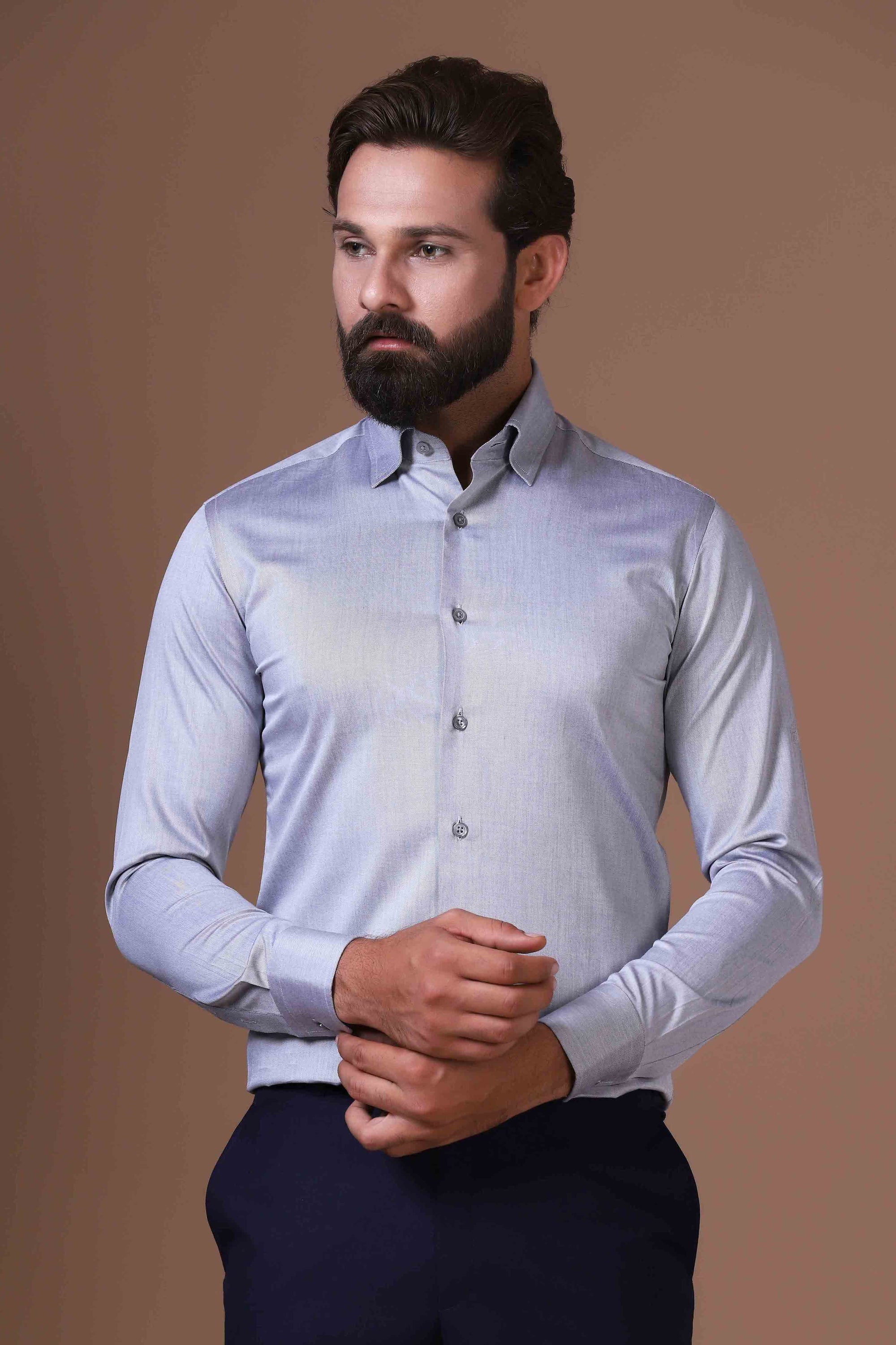 Effortless sophistication in our 100% cotton grey shirt. Concealed button-down collar and French placket elevate your everyday style. Shop Now!
