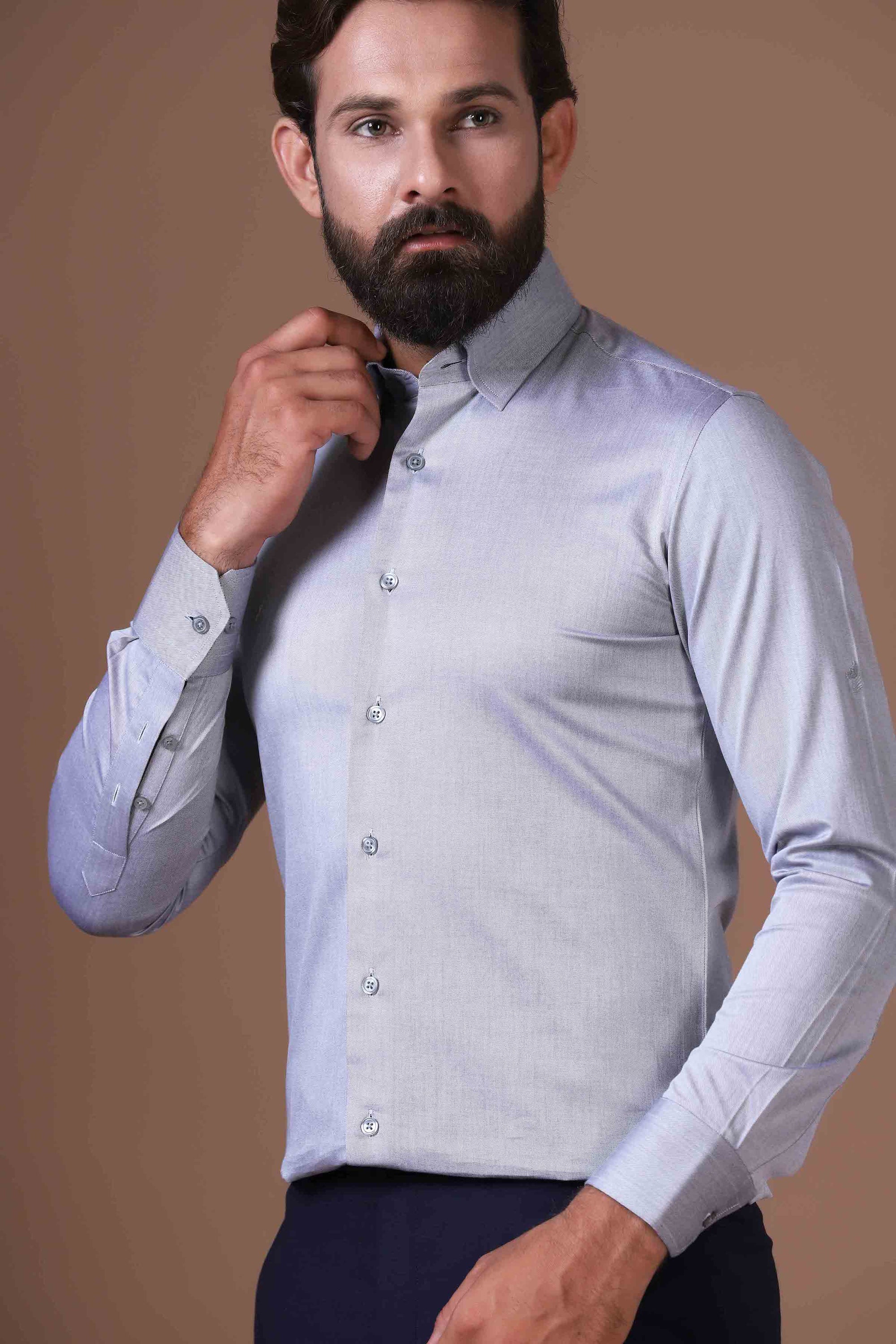 Effortless sophistication in our 100% cotton grey shirt. Concealed button-down collar and French placket elevate your everyday style. Shop Now!